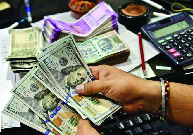 Rupee falls 4 paise to 83.16 against $   amid strengthening US bond yields