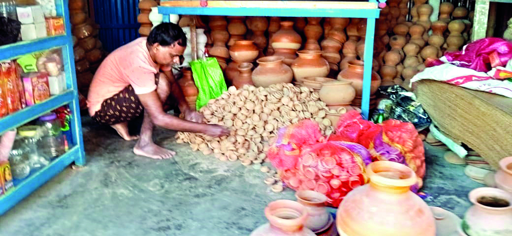 Balurghat: Festival of lights fails to bring cheer to clay lamp artisans