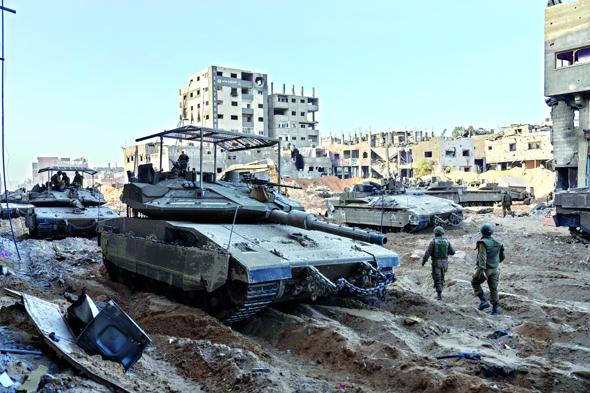 Israel air strikes Gaza City as ground forces battle Hamas near major hospital