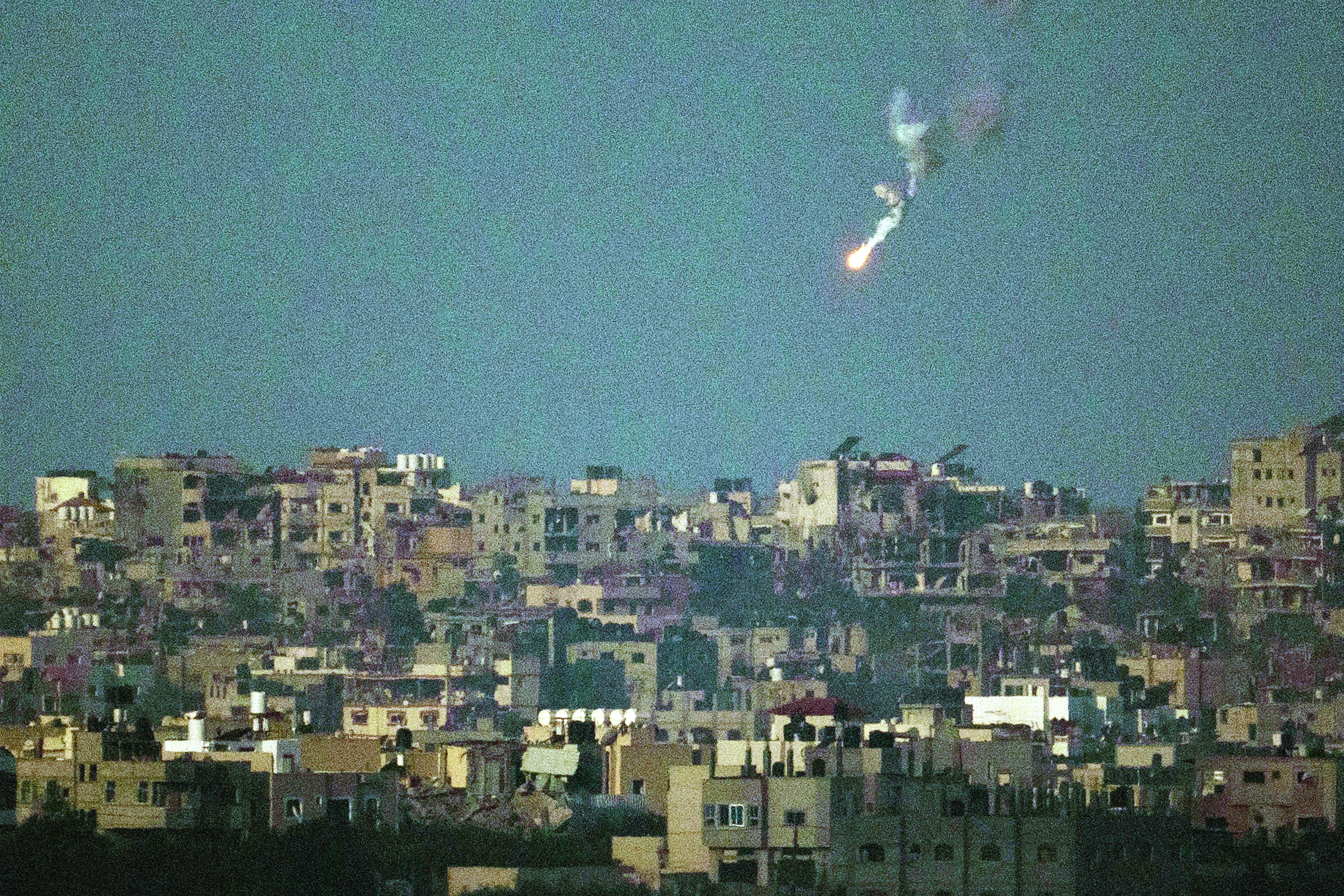 Shell hits Gaza hospital, killing 12, as heavy fighting breaks out