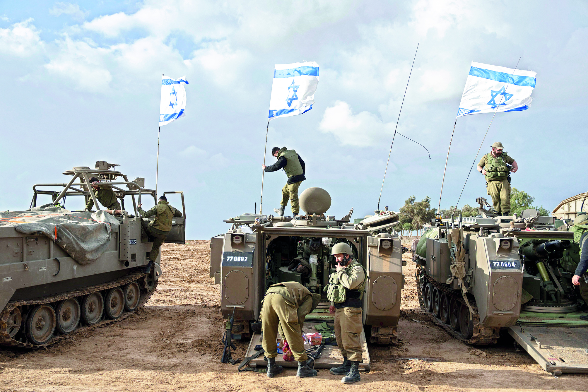 Israeli troops battle Palestinian militants across north Gaza