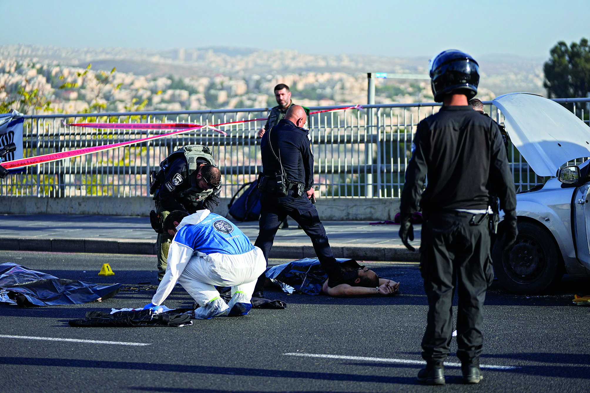 Three killed in shooting attack in Jerusalem, fragile ceasefire holds for seventh day