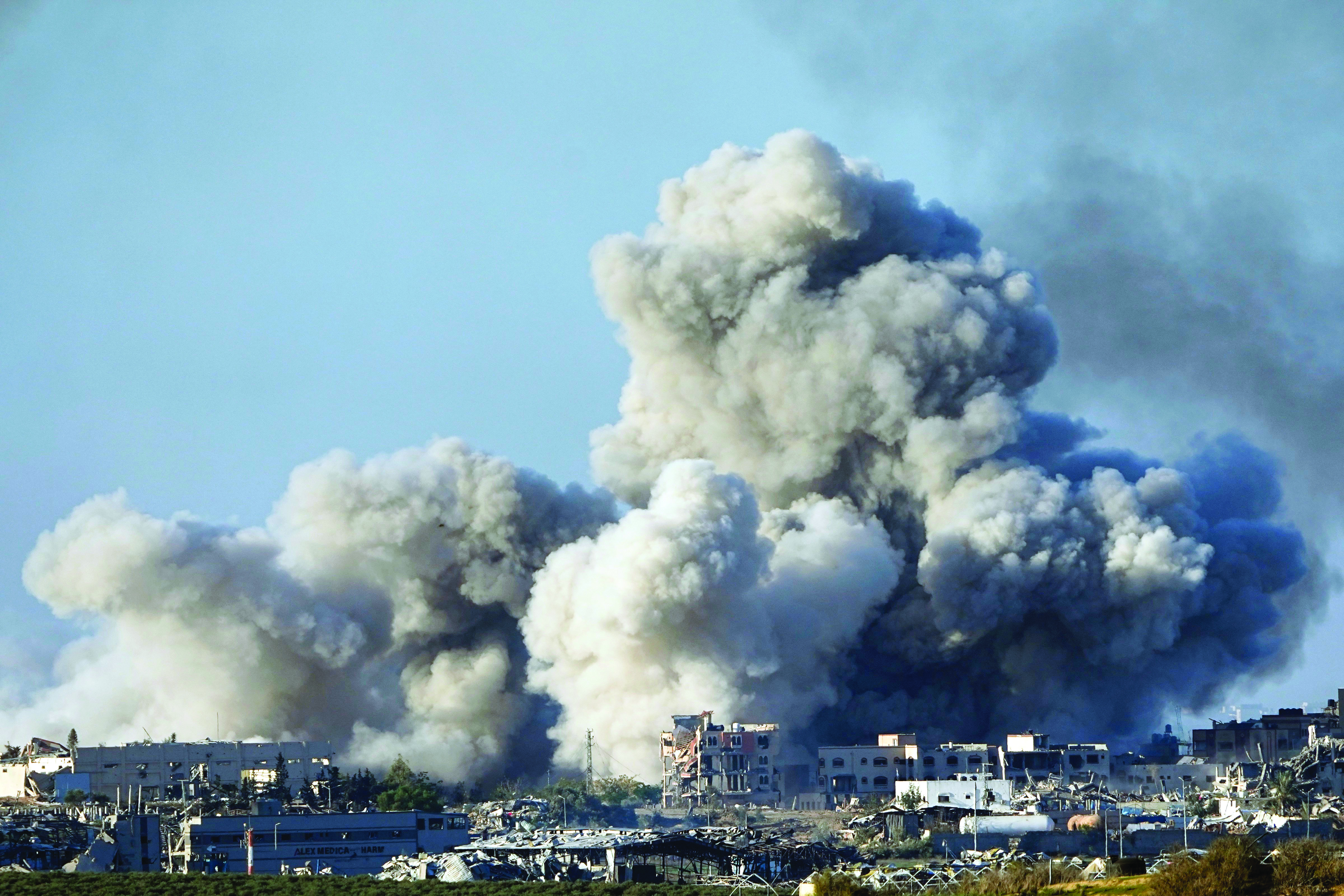 ‘Three hostages mistakenly killed by troops had been holding a white flag’