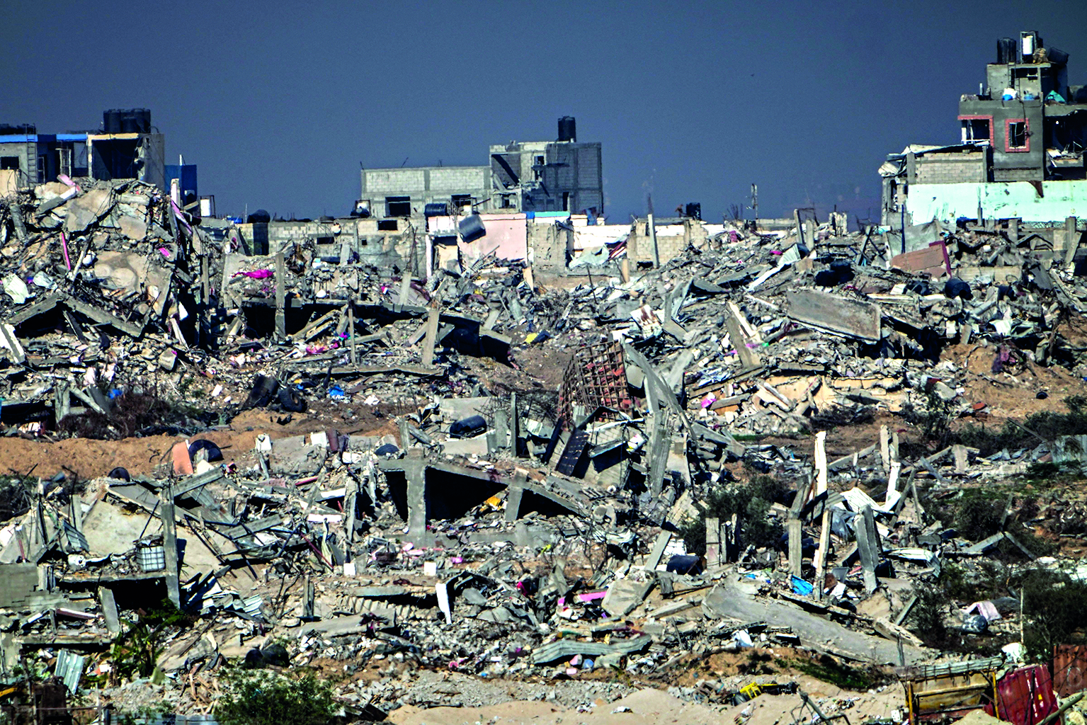 Displaced Palestinians flood southern Gaza town as Israel expands its offensive in centre