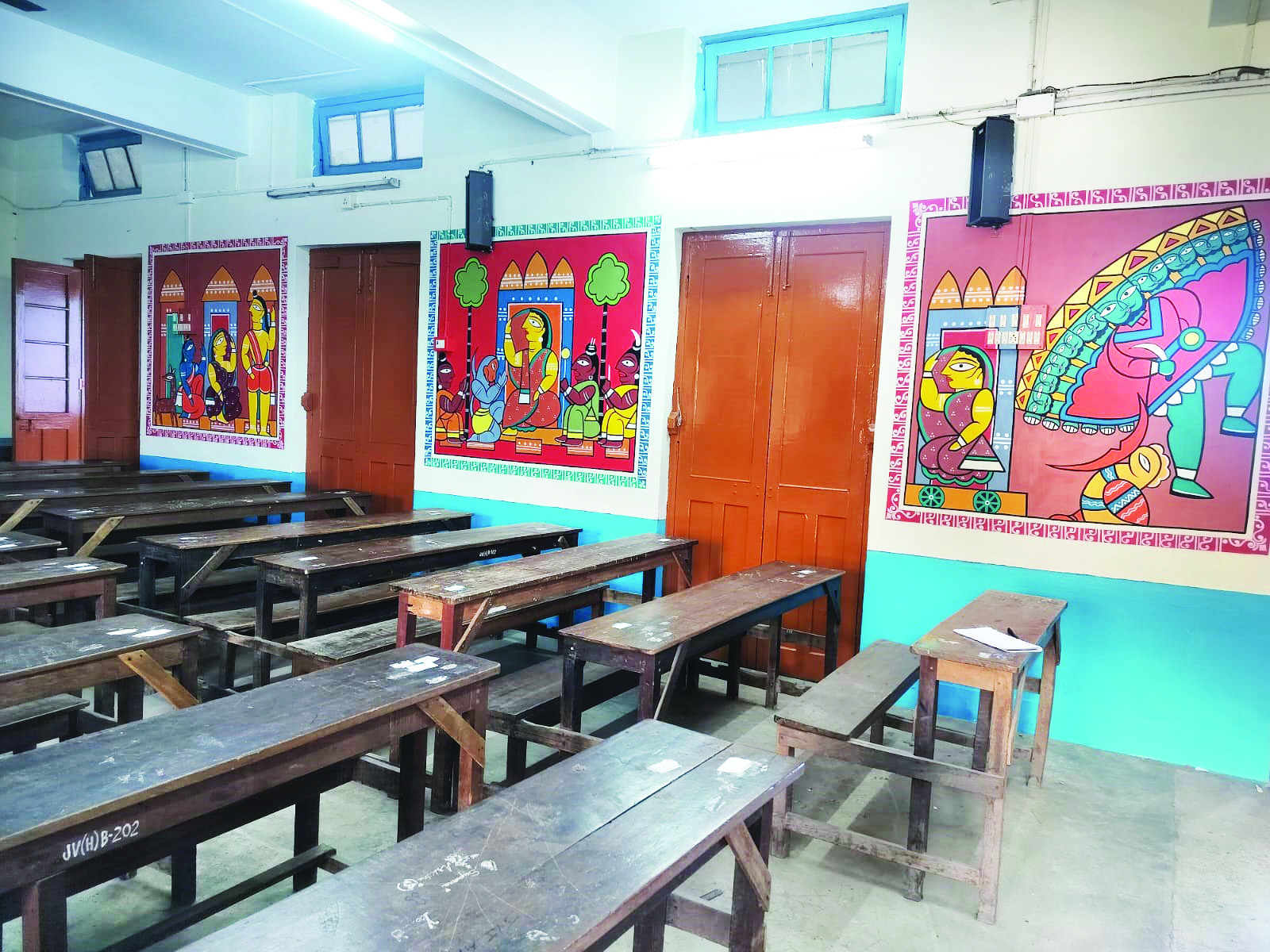 Murals of popular characters from Bengali fiction books adorn classroom walls Murals of popular characters from Bengali fiction books adorn classroom walls
