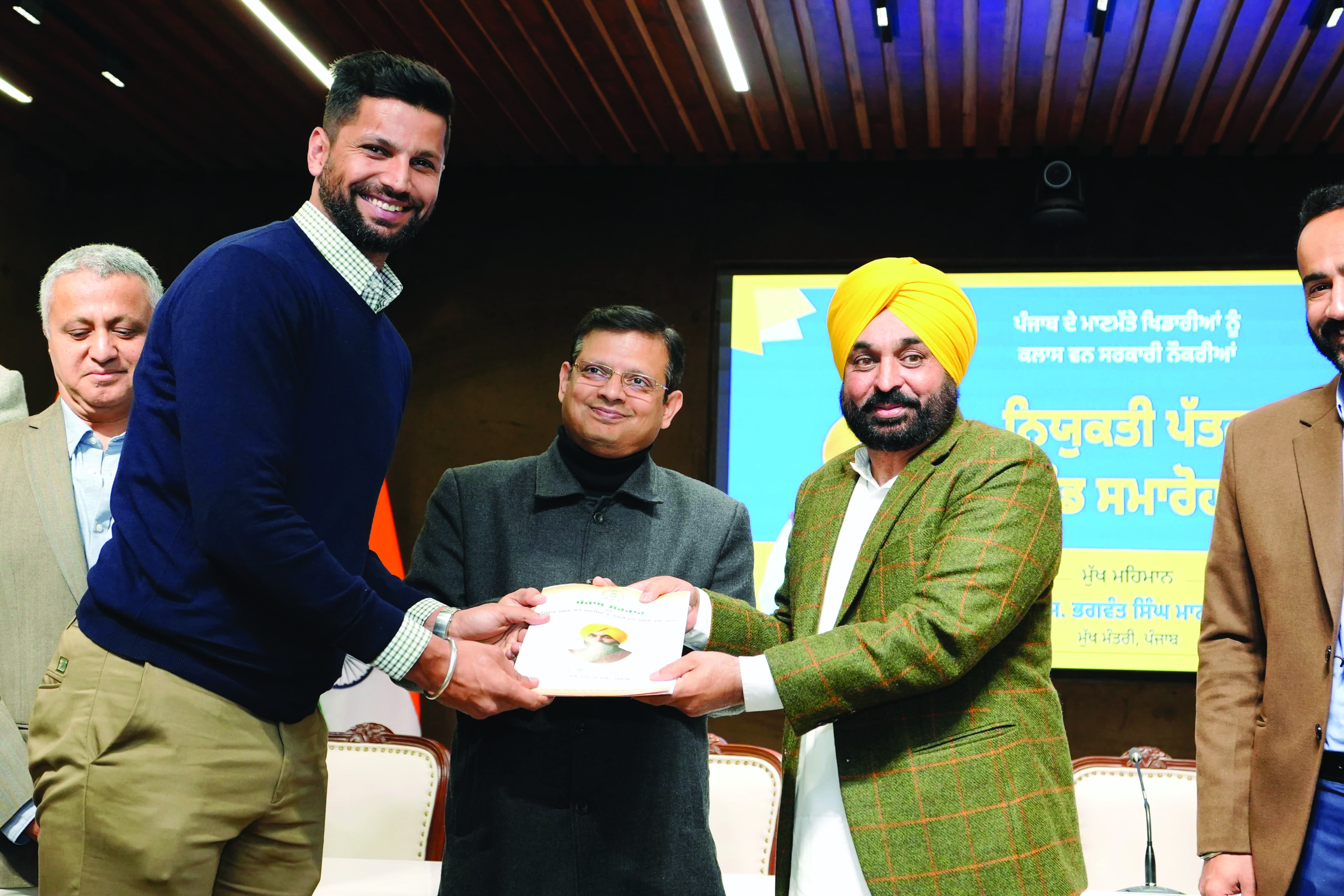 CM Mann hands over appointment letters for PCS and PPS posts to 11 players CM Mann hands over appointment letters for PCS and PPS posts to 11 players