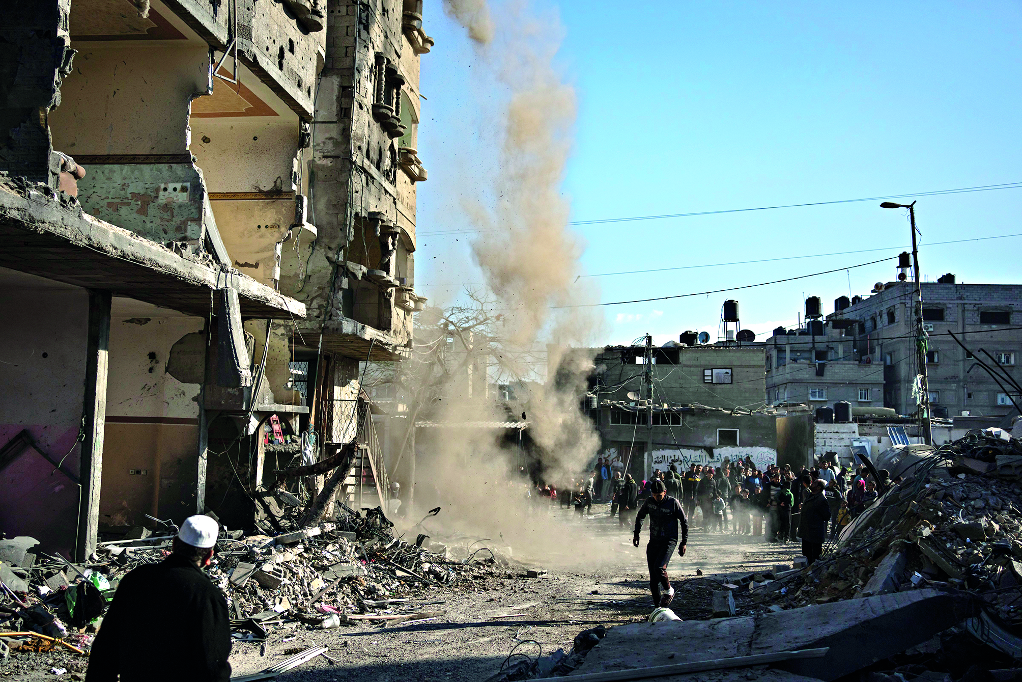 Israeli strikes in Gaza kill 48 people as fears mount over West Bank violence