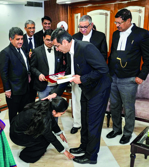 CJI, Supreme Court judges felicitate cook’s daughter set to pursue masters in law in US