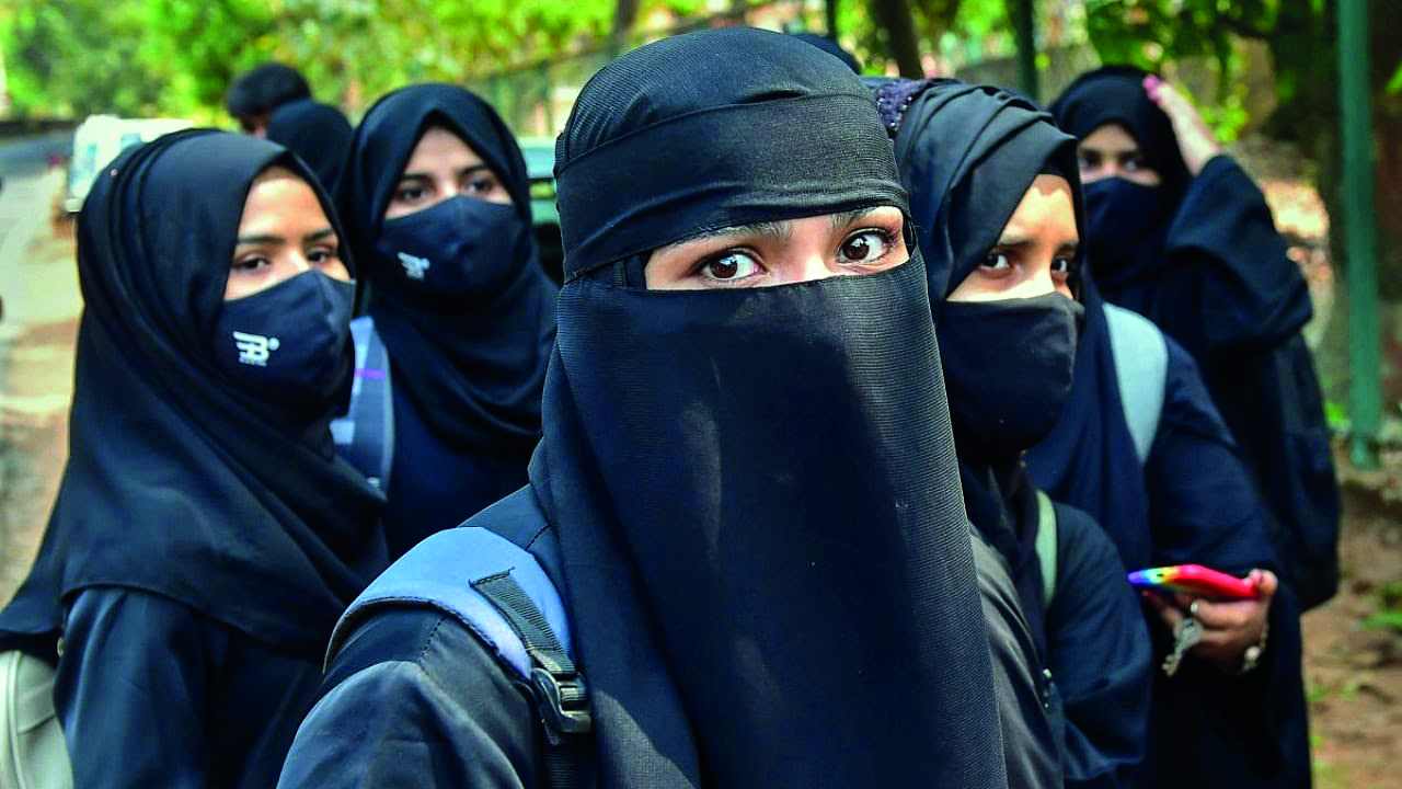 Gujarat school asks class X girl students to remove hijab during exam, parents complain Gujarat school asks class X girl students to remove hijab during exam, parents complain