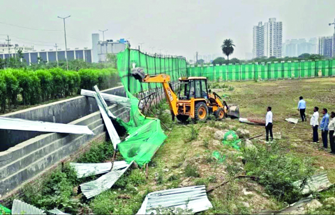 Noida Authority frees over 12K sq mtrs of illegally occupied land