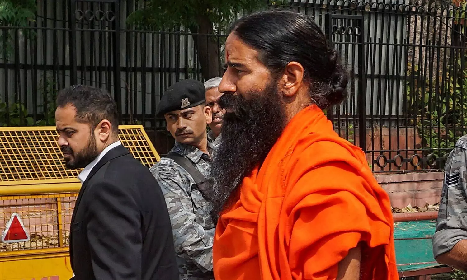 SC asks Ramdev, Balkrishna to issue public apology