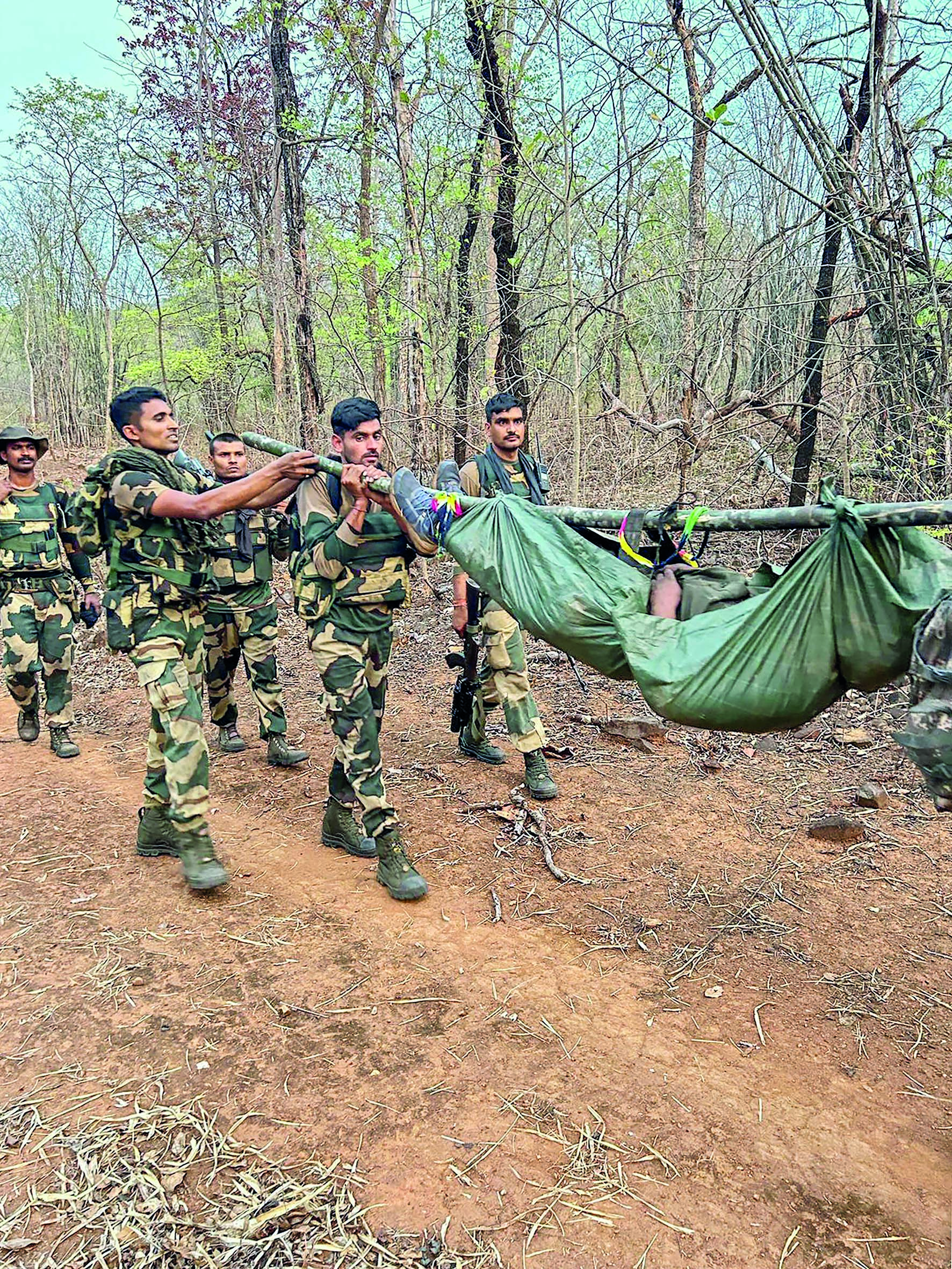 Silence in air, bullet marks on trees at encounter site where 29 Naxals were killed