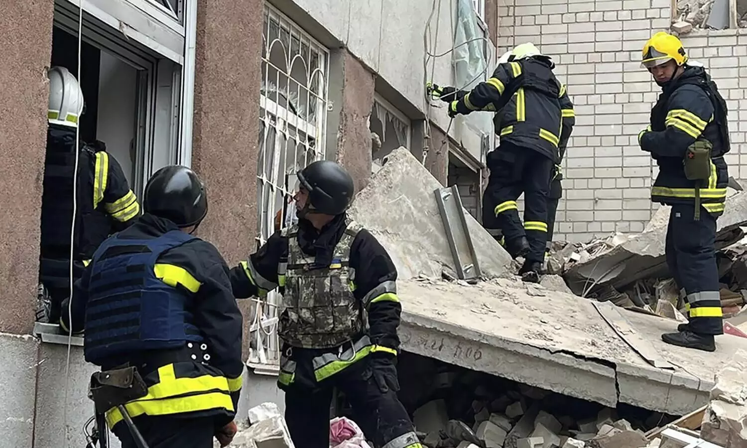 As Russia edges toward a possible offensive on Kharkiv, few residents flee. Others refuse to leave