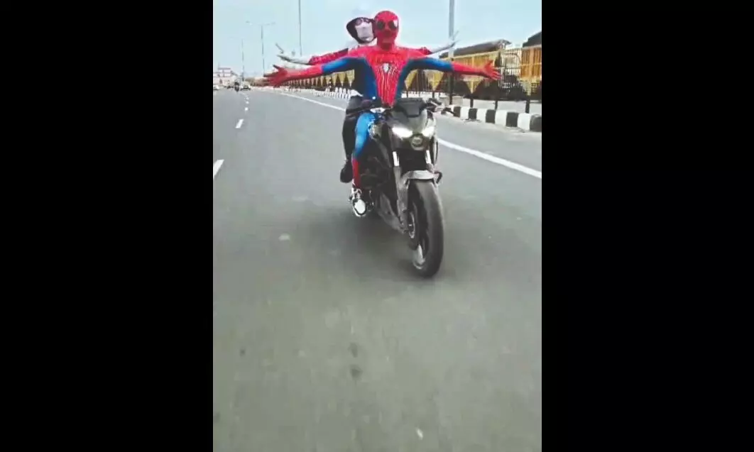 Spiderman takes Spiderwoman on a bike ride, both arrested Spiderman takes Spiderwoman on a bike ride, both arrested