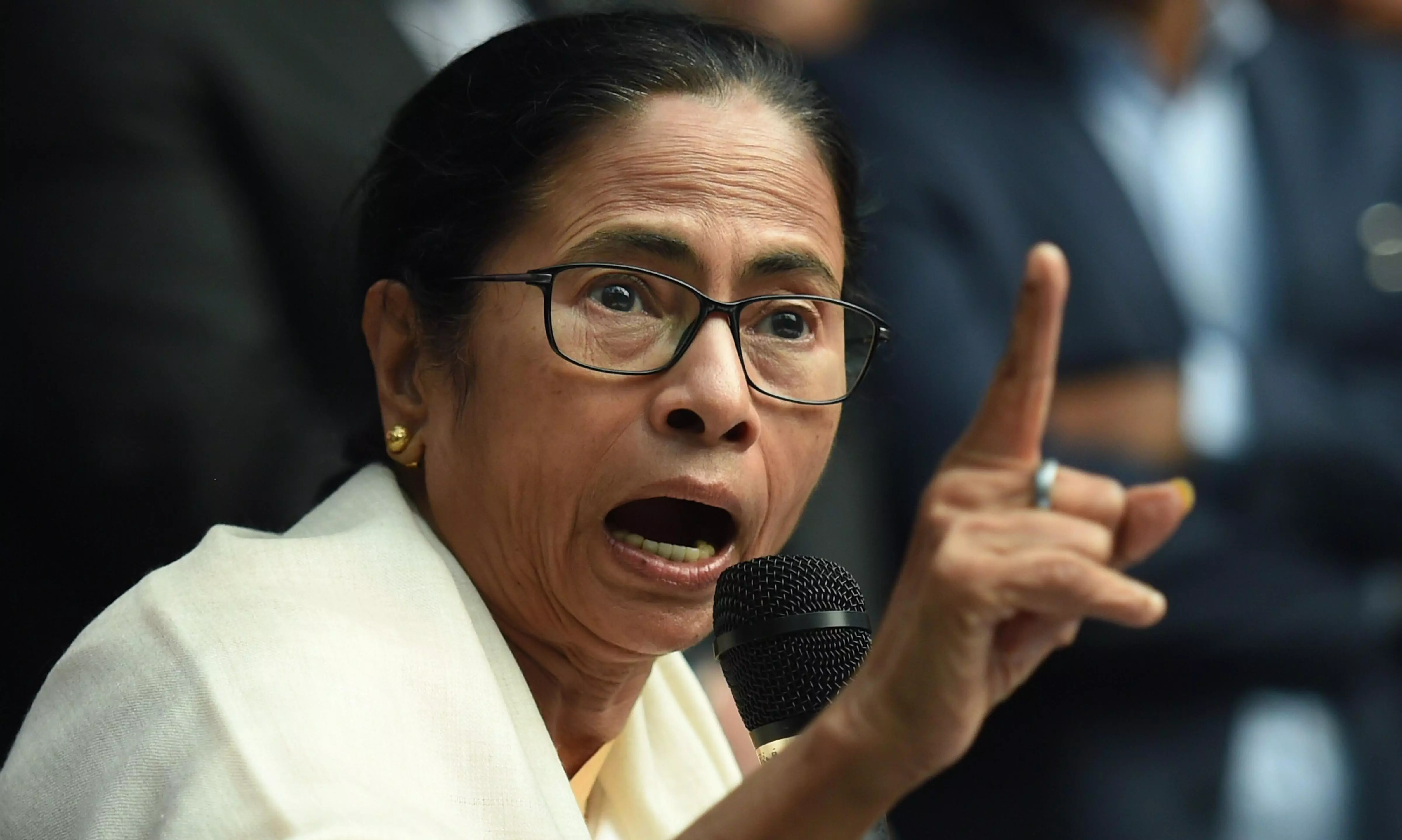 Mamata Banerjee questions revised poll figures Mamata Banerjee questions revised poll figures