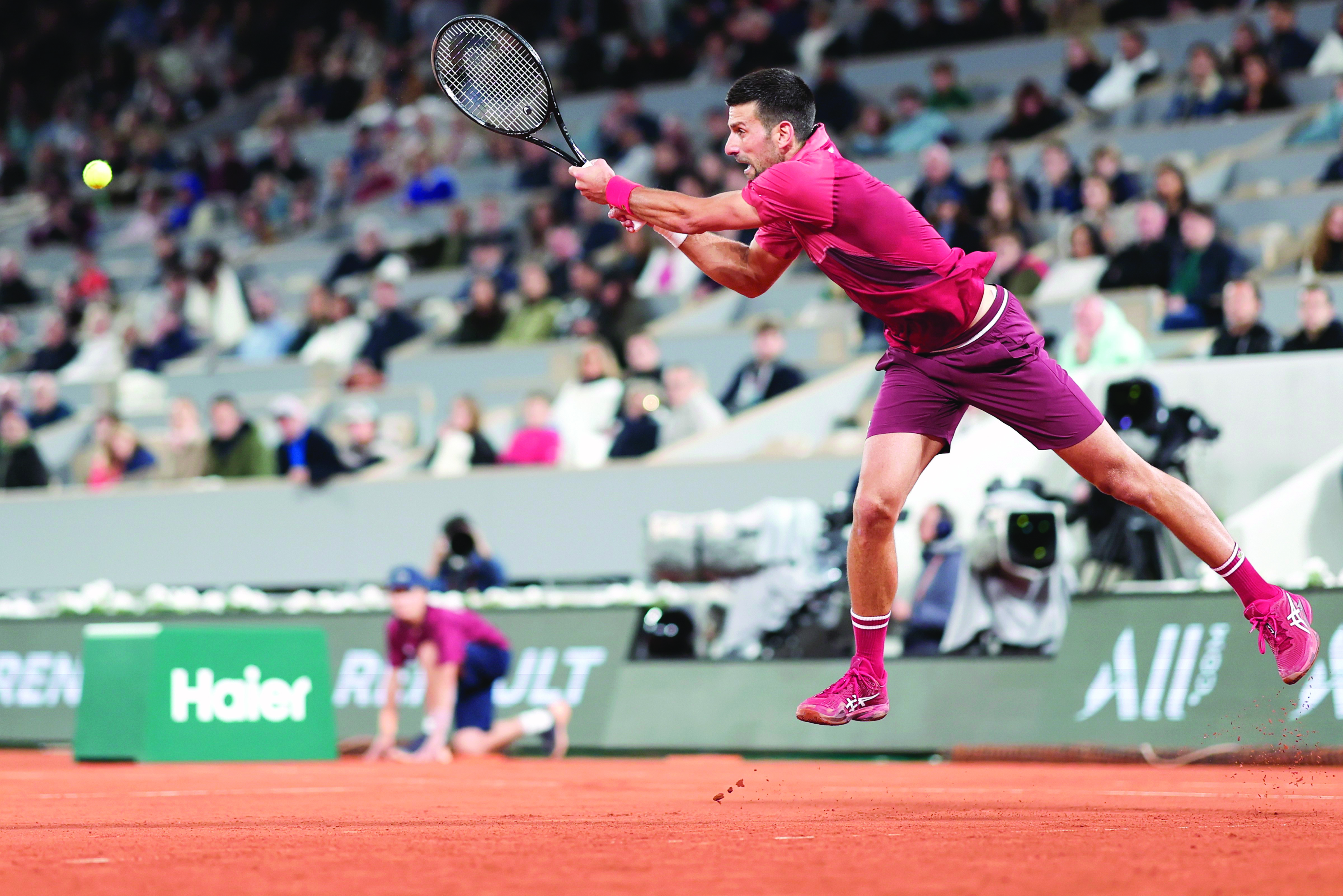 Djokovic wins late-night Roland Garros thriller over Musetti