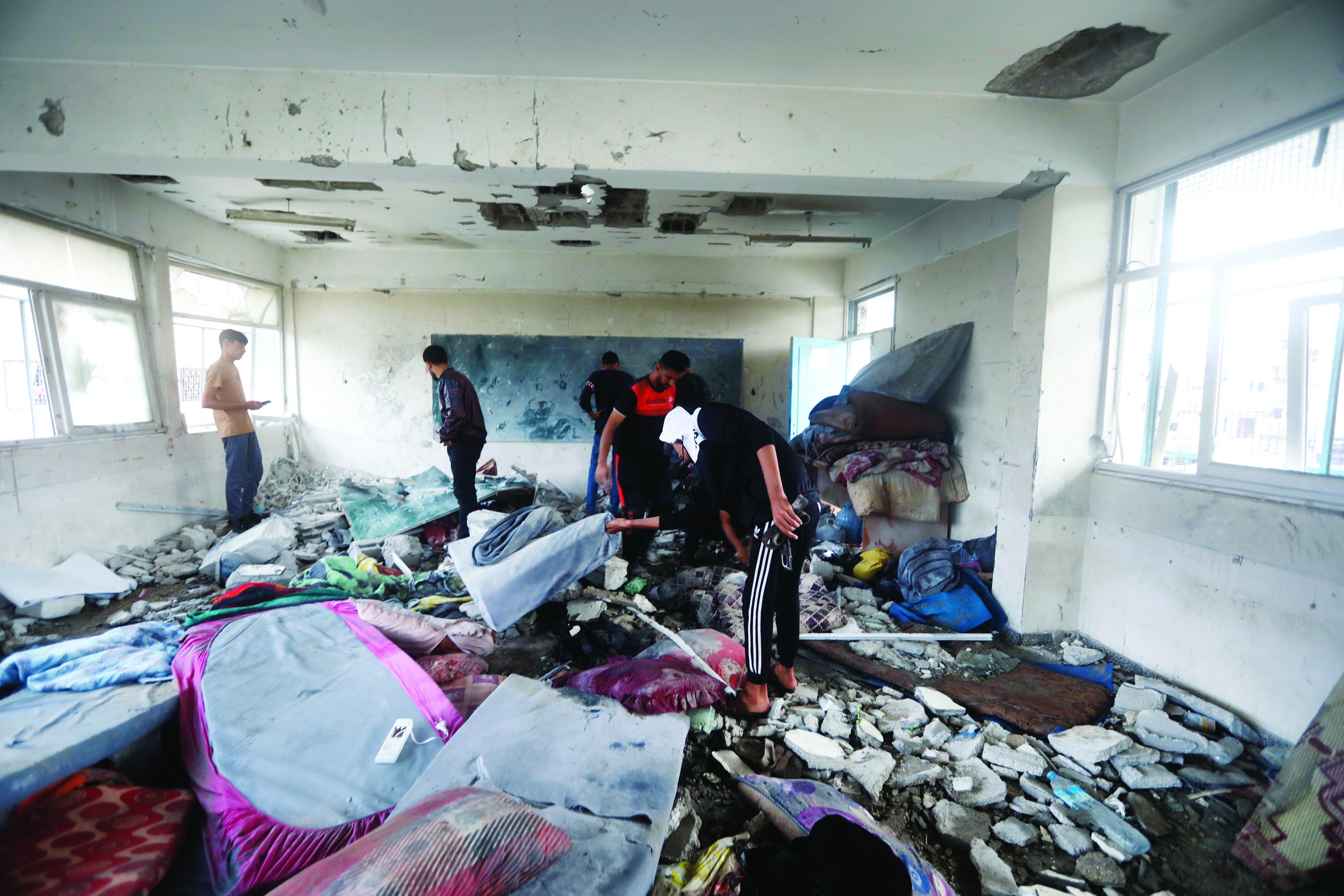 Israeli strikes kill 18 in central Gaza a day after school attack Israeli strikes kill 18 in central Gaza a day after school attack