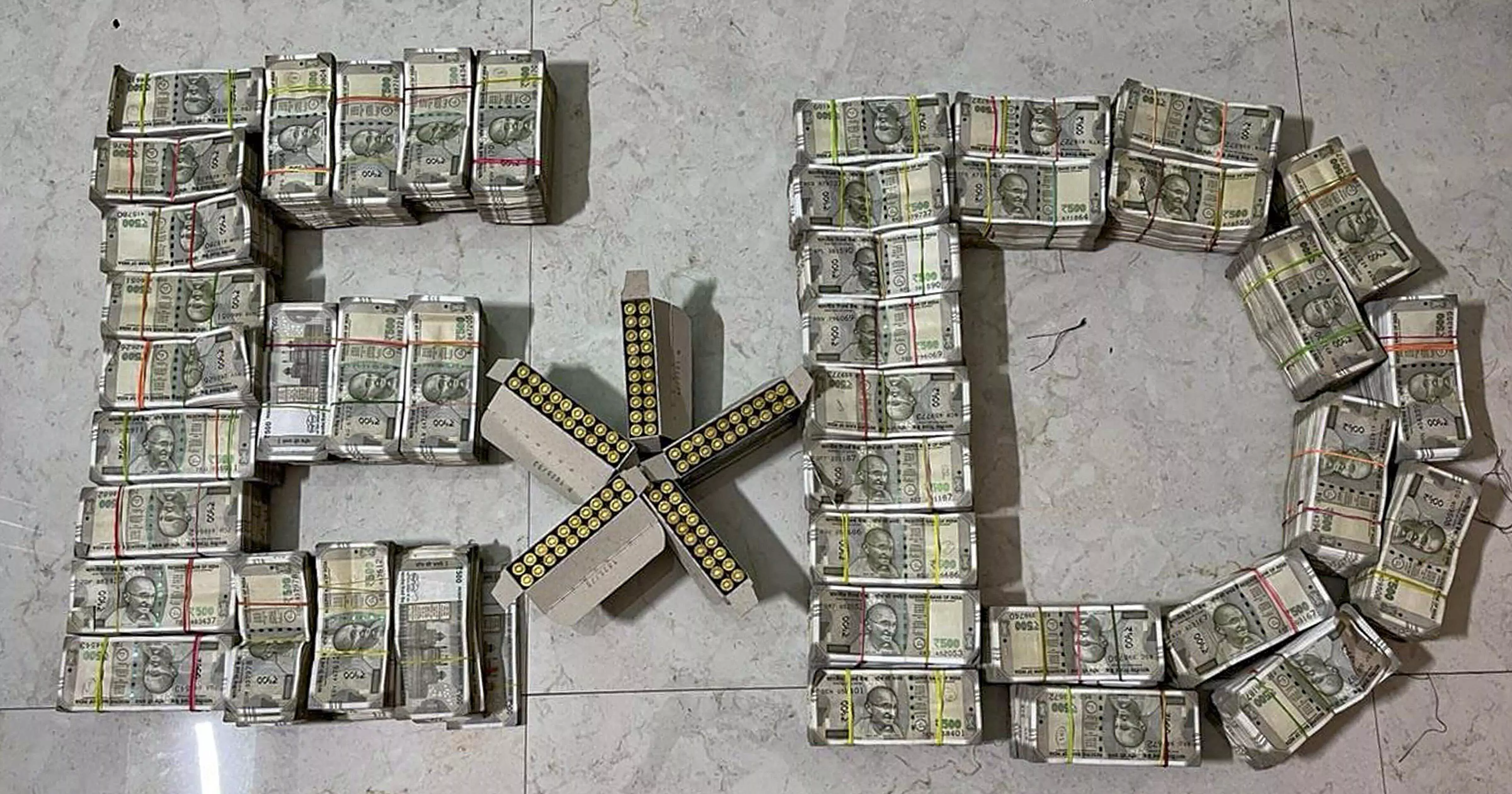 ED raids in Ranchi recovers Rs 1 cr cash, 100 bullets in land grab case ED raids in Ranchi recovers Rs 1 cr cash, 100 bullets in land grab case