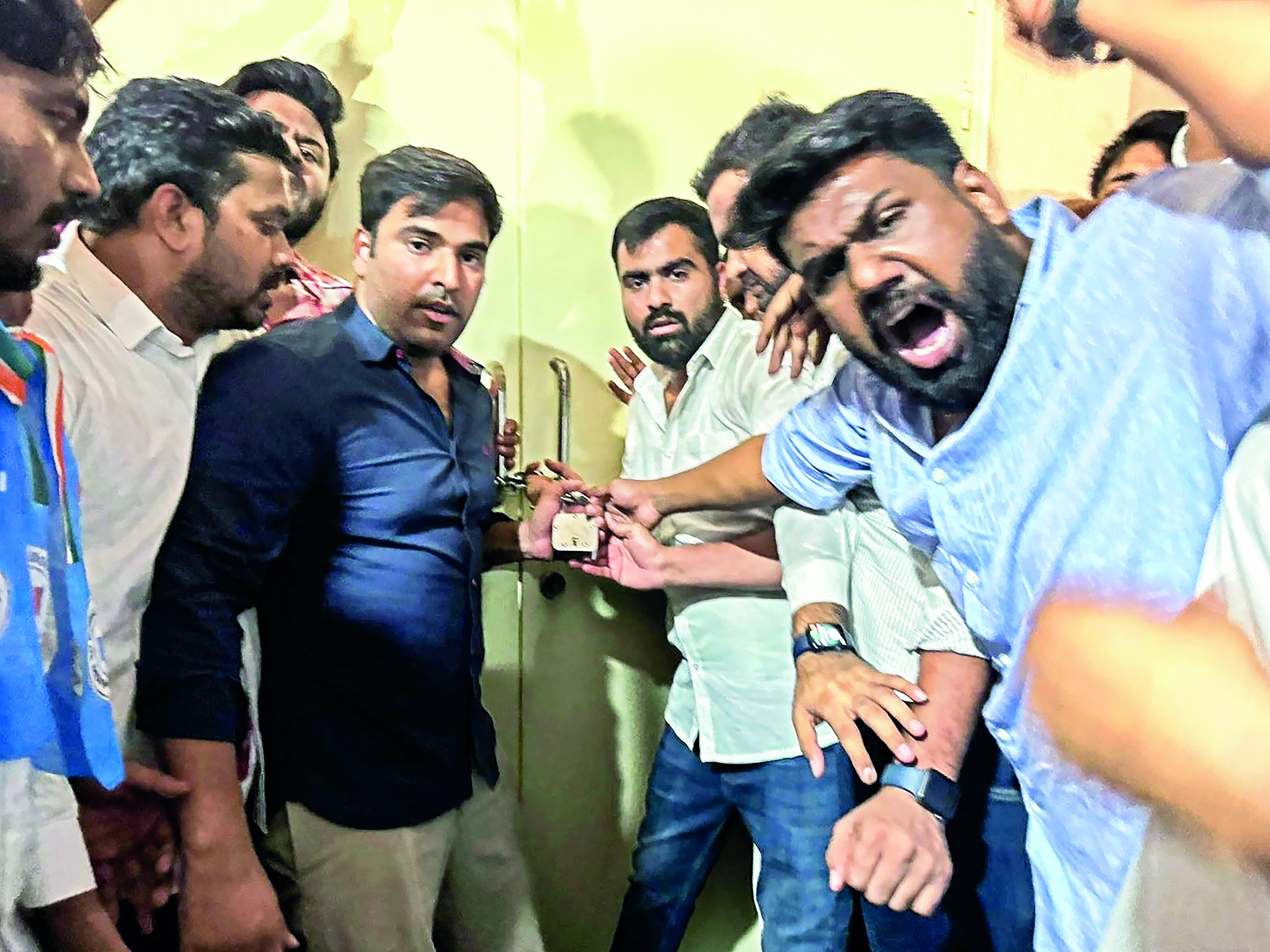 NEET-UG row: NSUI members barge into NTA office, lock door NEET-UG row: NSUI members barge into NTA office, lock door