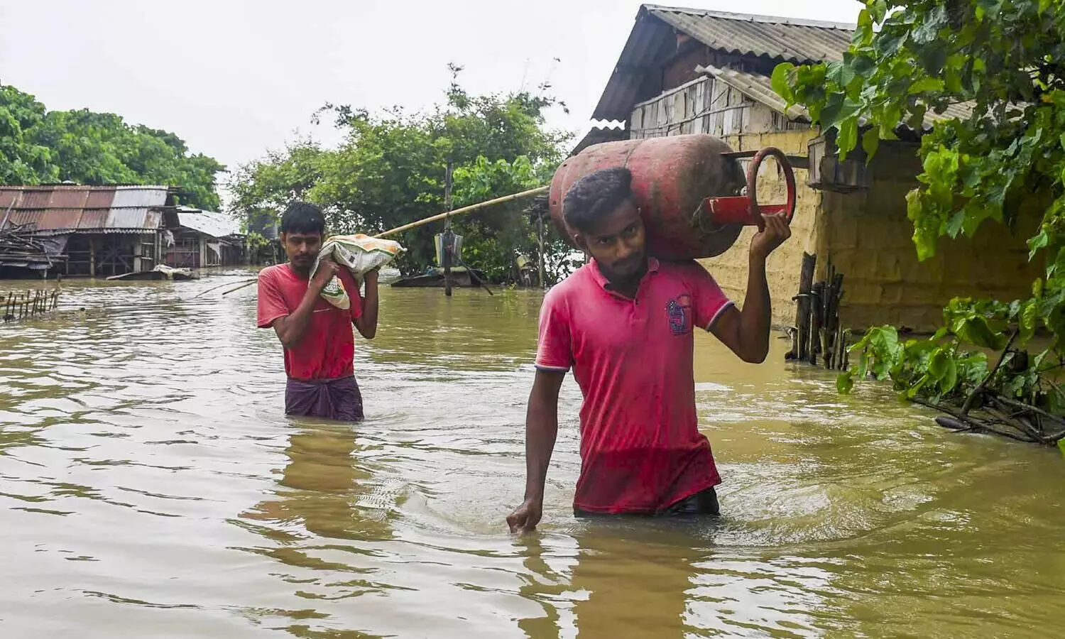 Over 6.71 lakh hit by floods in Assam; IAF rescues 13 fishermen