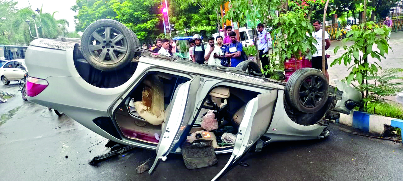 Car rams with median divider, two injured Car rams with median divider, two injured