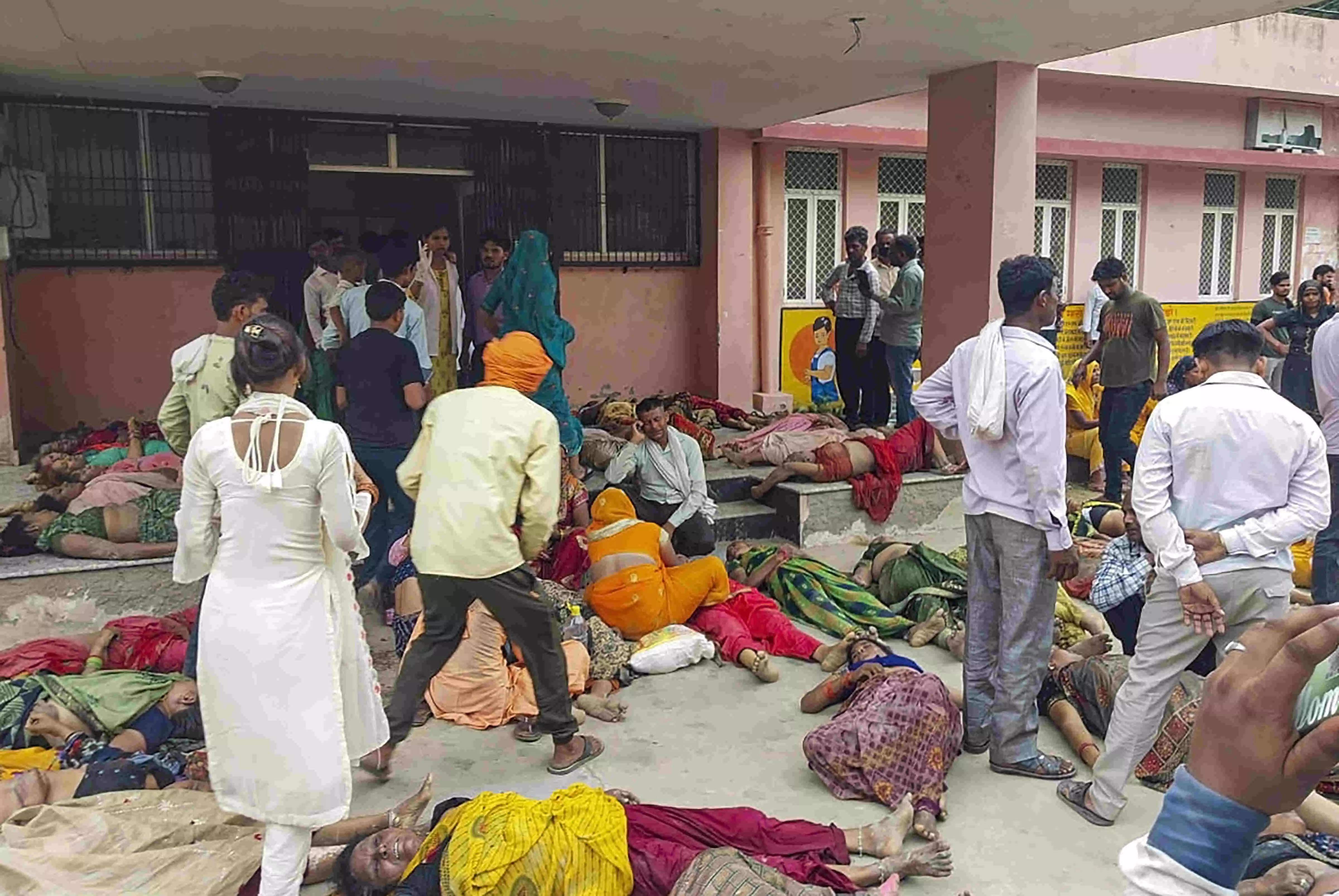 Outside Hathras hospital, bodies of stampede victims lay on the floor, loud wails pierce the air