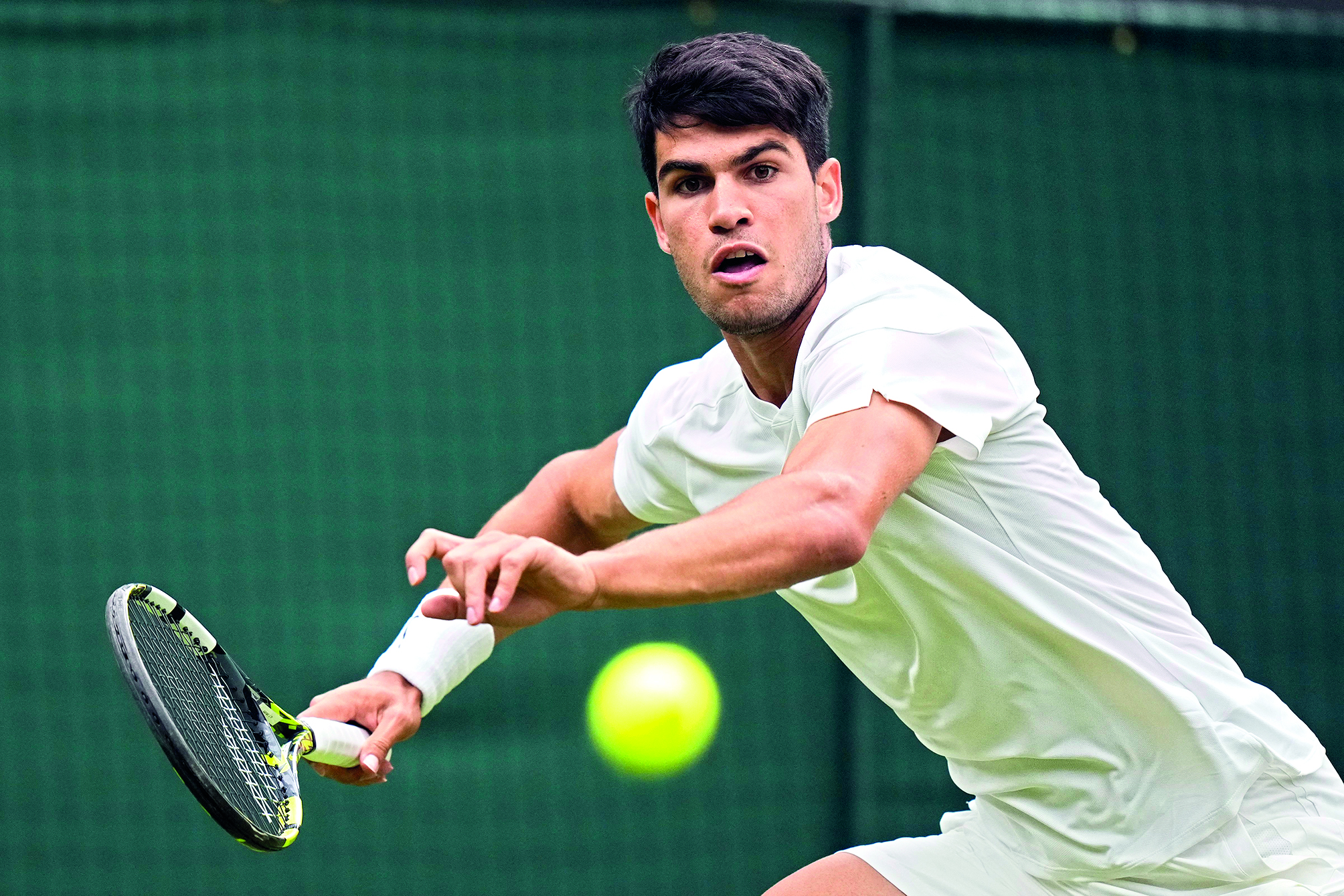 Wimbledon champion Carlos Alcaraz comes back to beat Frances Tiafoe in third round Wimbledon champion Carlos Alcaraz comes back to beat Frances Tiafoe in third round