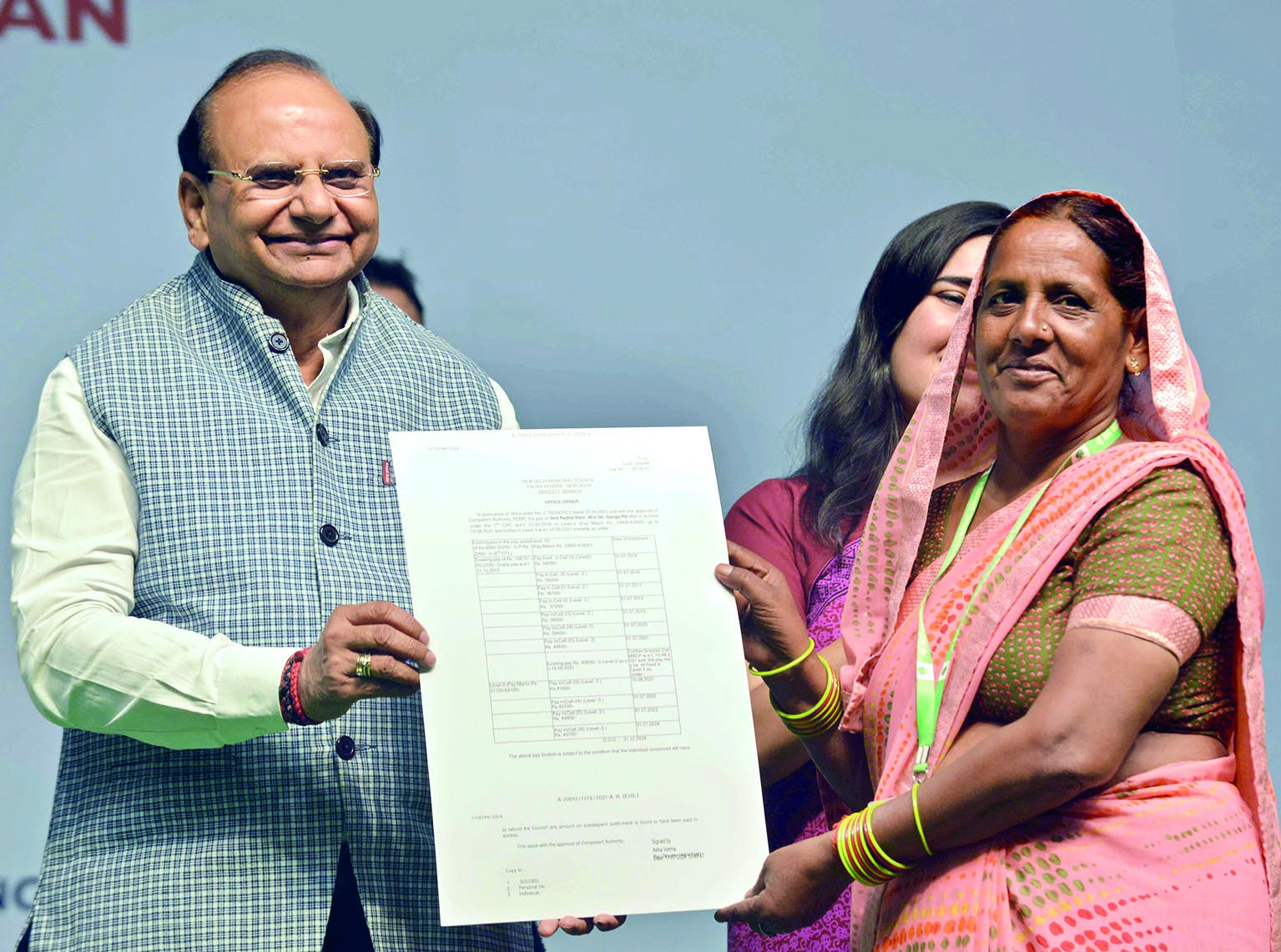 L-G distributes letters of promotion and other benefits to over 9,600 NDMC staff