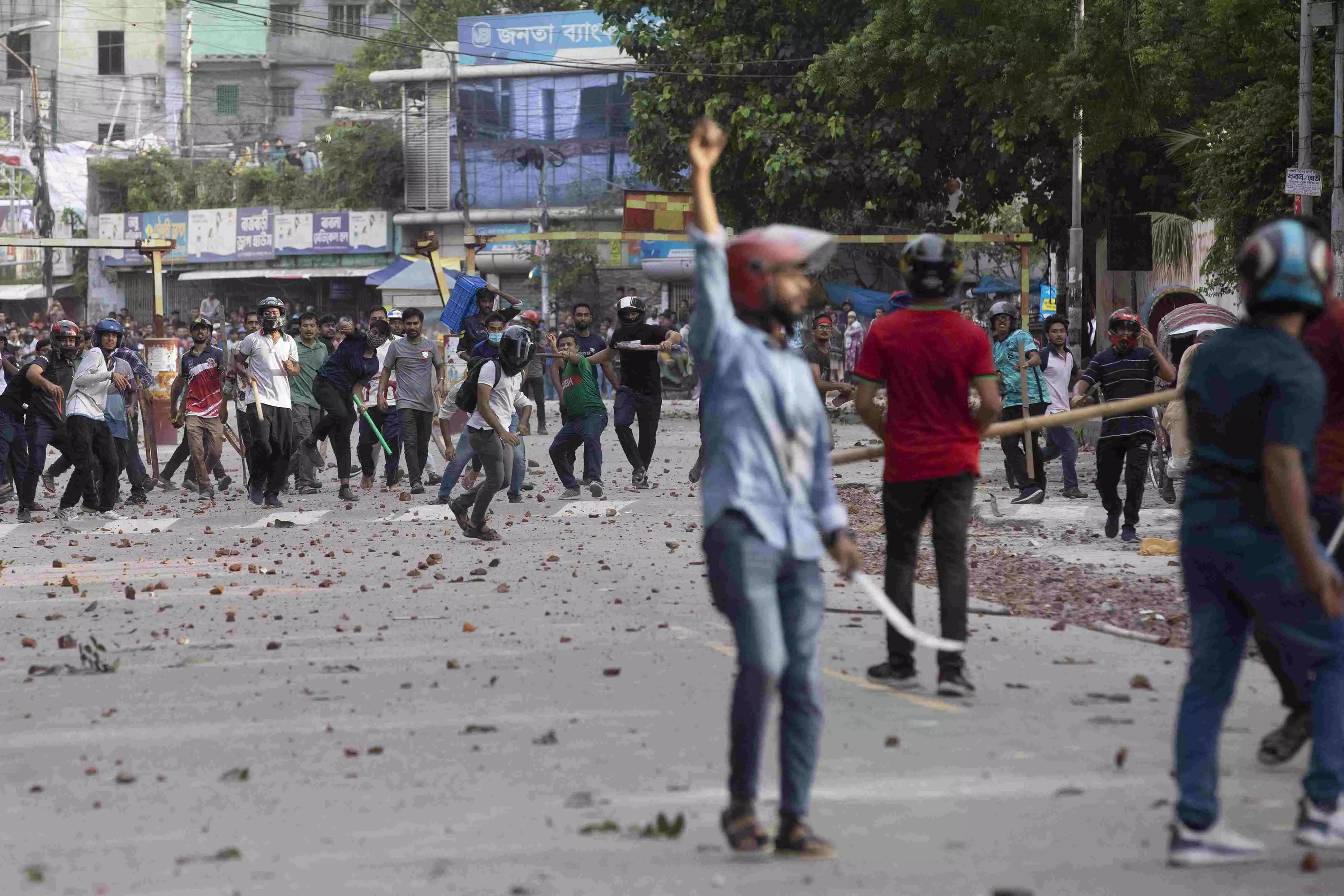 Bangladesh security forces fire bullets and sound grenades as protests escalate