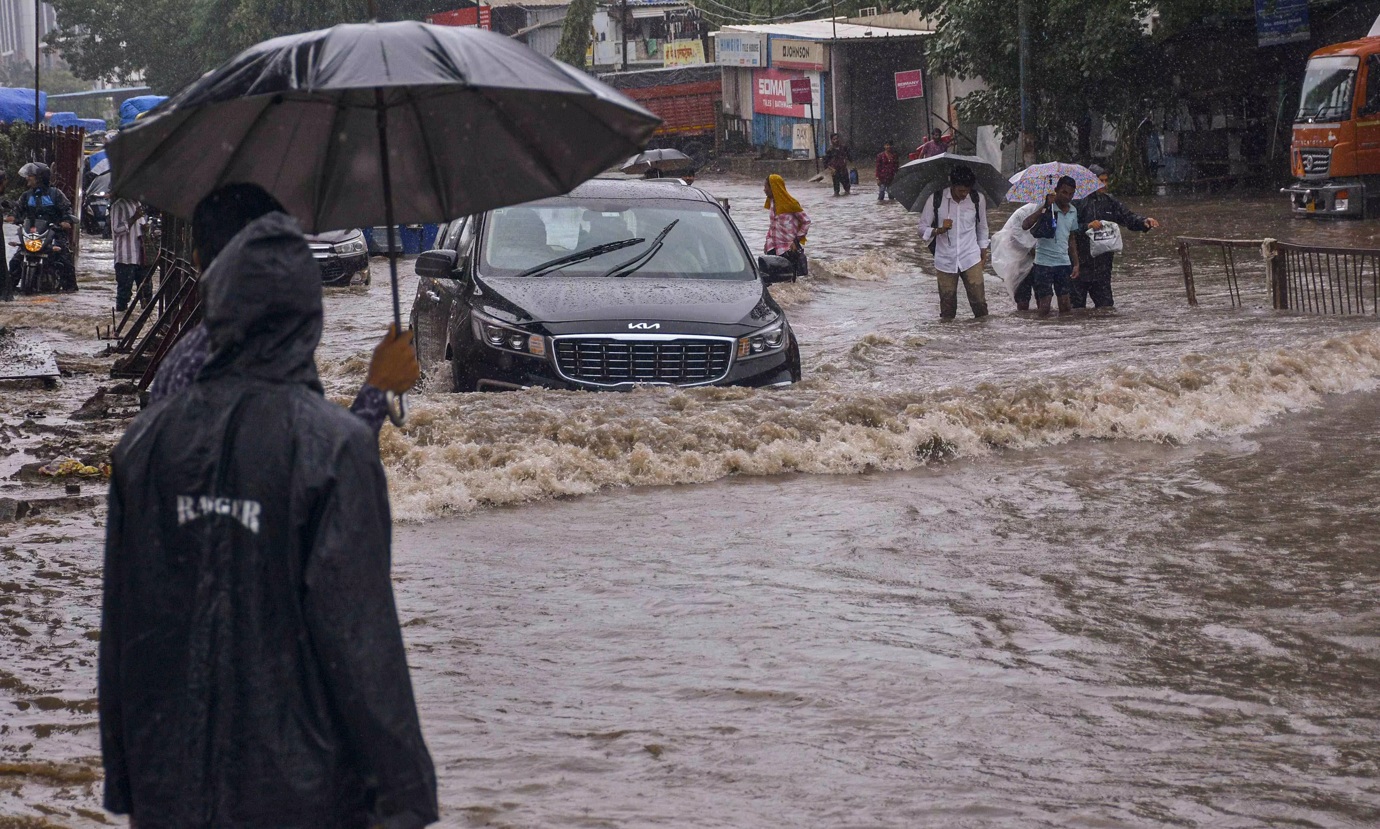 Hundreds relocated as heavy rains batter south, central Gujarat districts; trains affected Hundreds relocated as heavy rains batter south, central Gujarat districts; trains affected