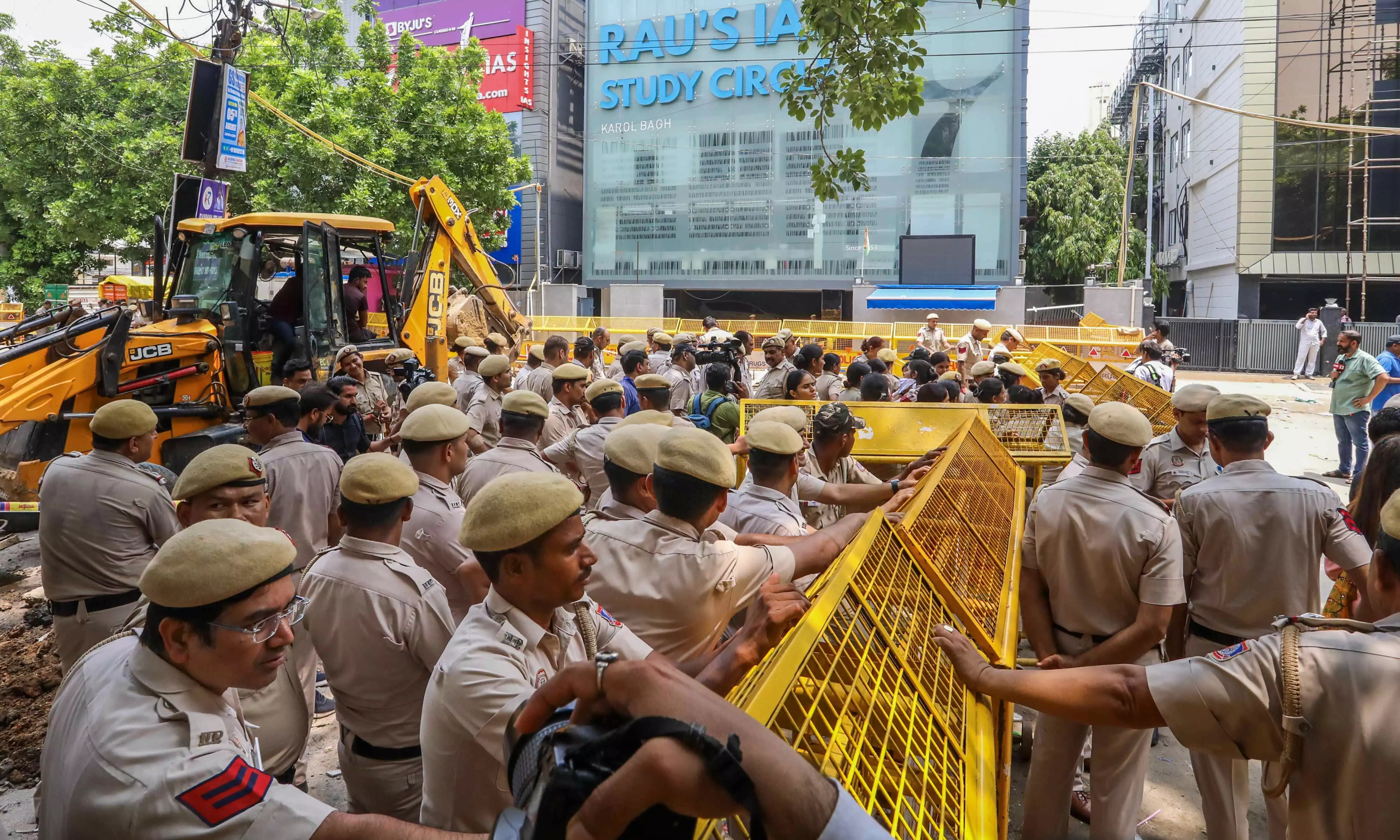 Delhi Coaching centre deaths: 5 more held, bulldozers in action as anger, anguish mount Delhi Coaching centre deaths: 5 more held, bulldozers in action as anger, anguish mount