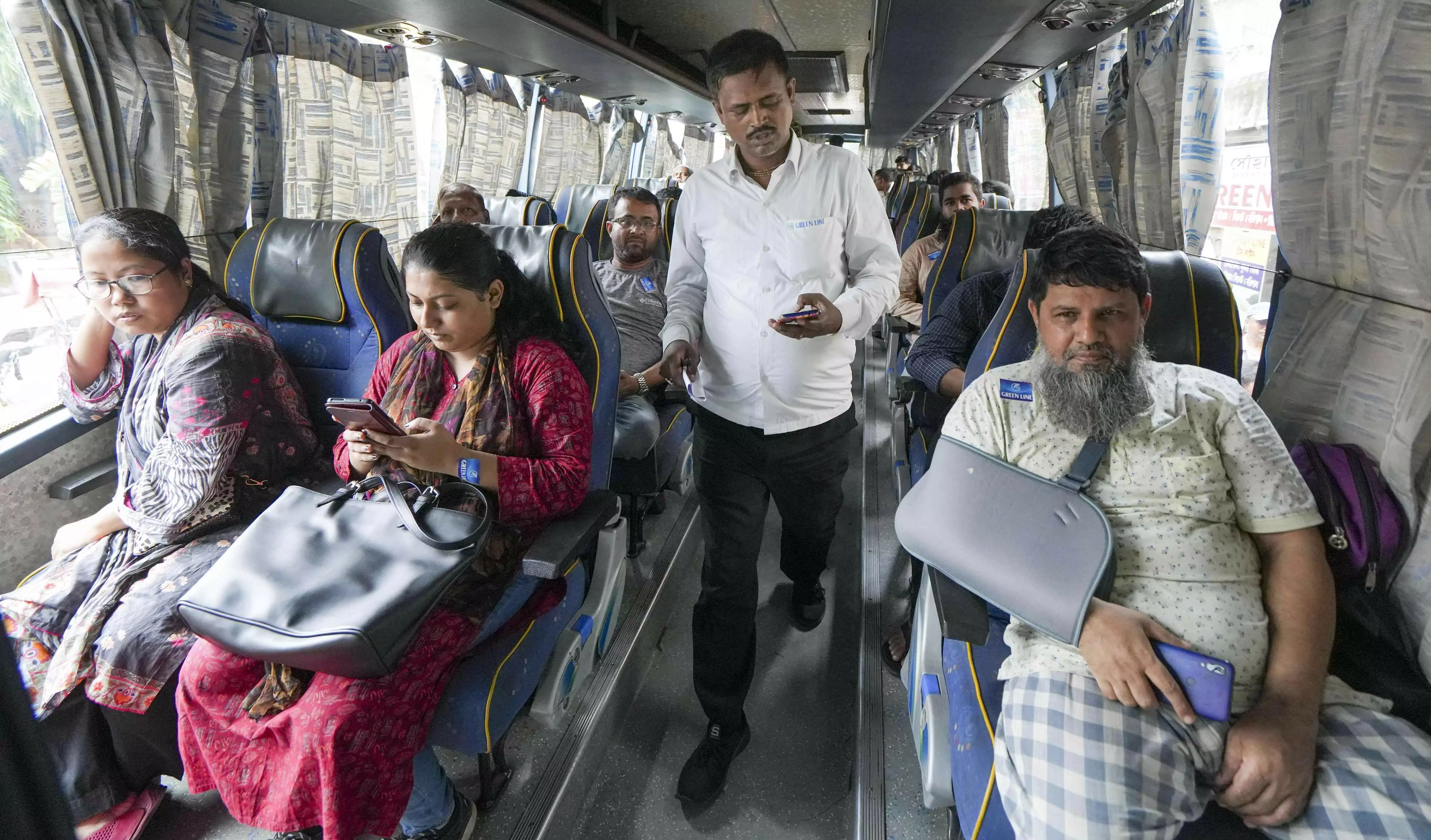 45 Bangladeshi passengers deboard at Petrapole border as Dhaka-Kolkata buses stop plying 45 Bangladeshi passengers deboard at Petrapole border as Dhaka-Kolkata buses stop plying