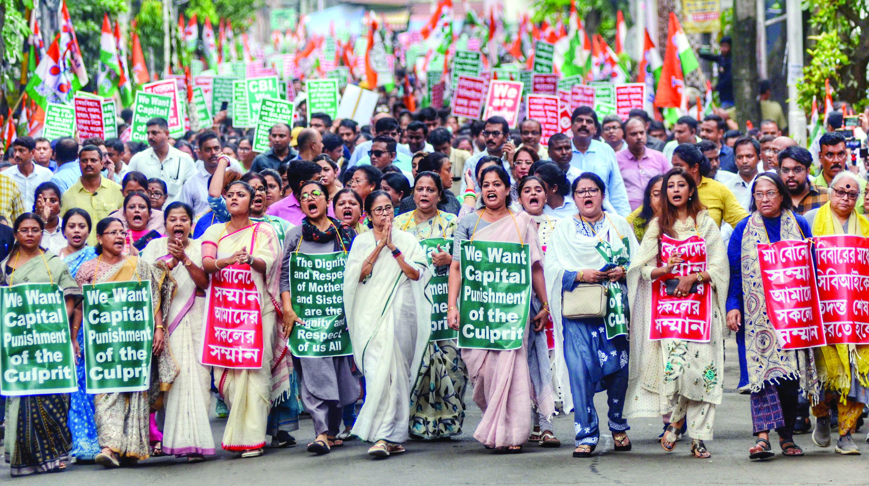 Mamata leads massive rally in city, demands capital punishment for guilty Mamata leads massive rally in city, demands capital punishment for guilty