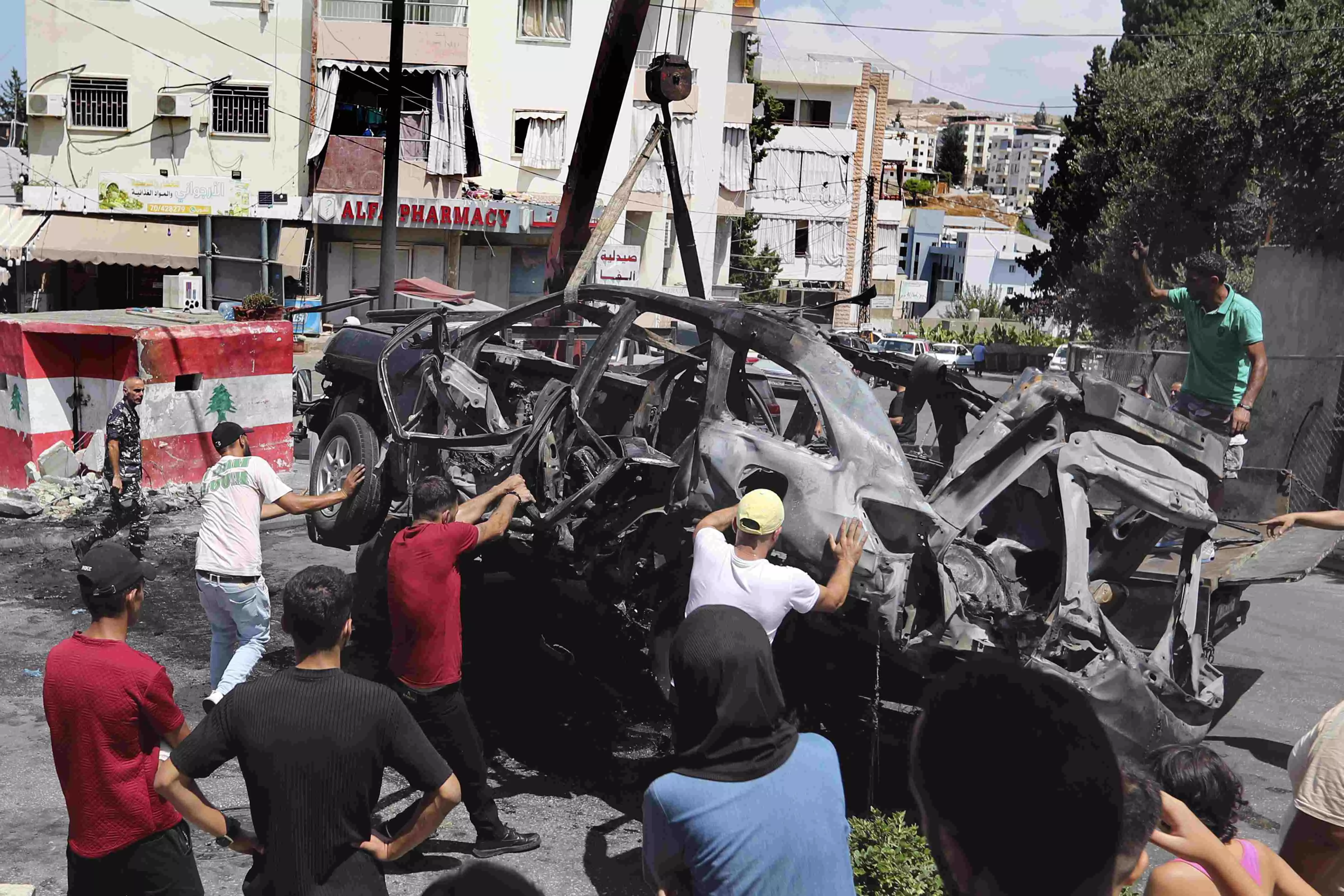 Israel and Hezbollah trade heavy fire before pulling back, jolting a region braced for war