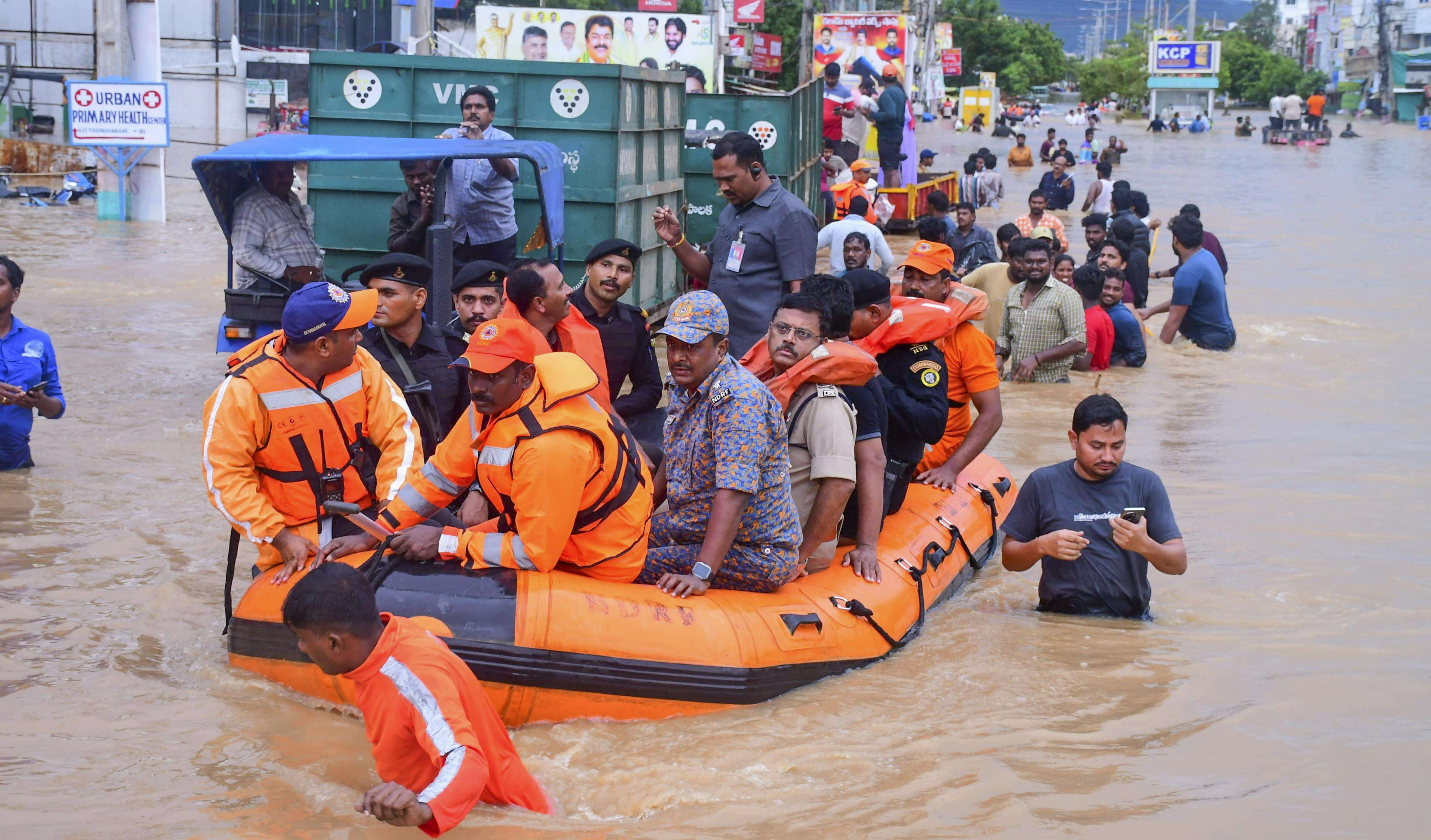 Rains throw life out of gear in Vijayawada with power cuts, traffic