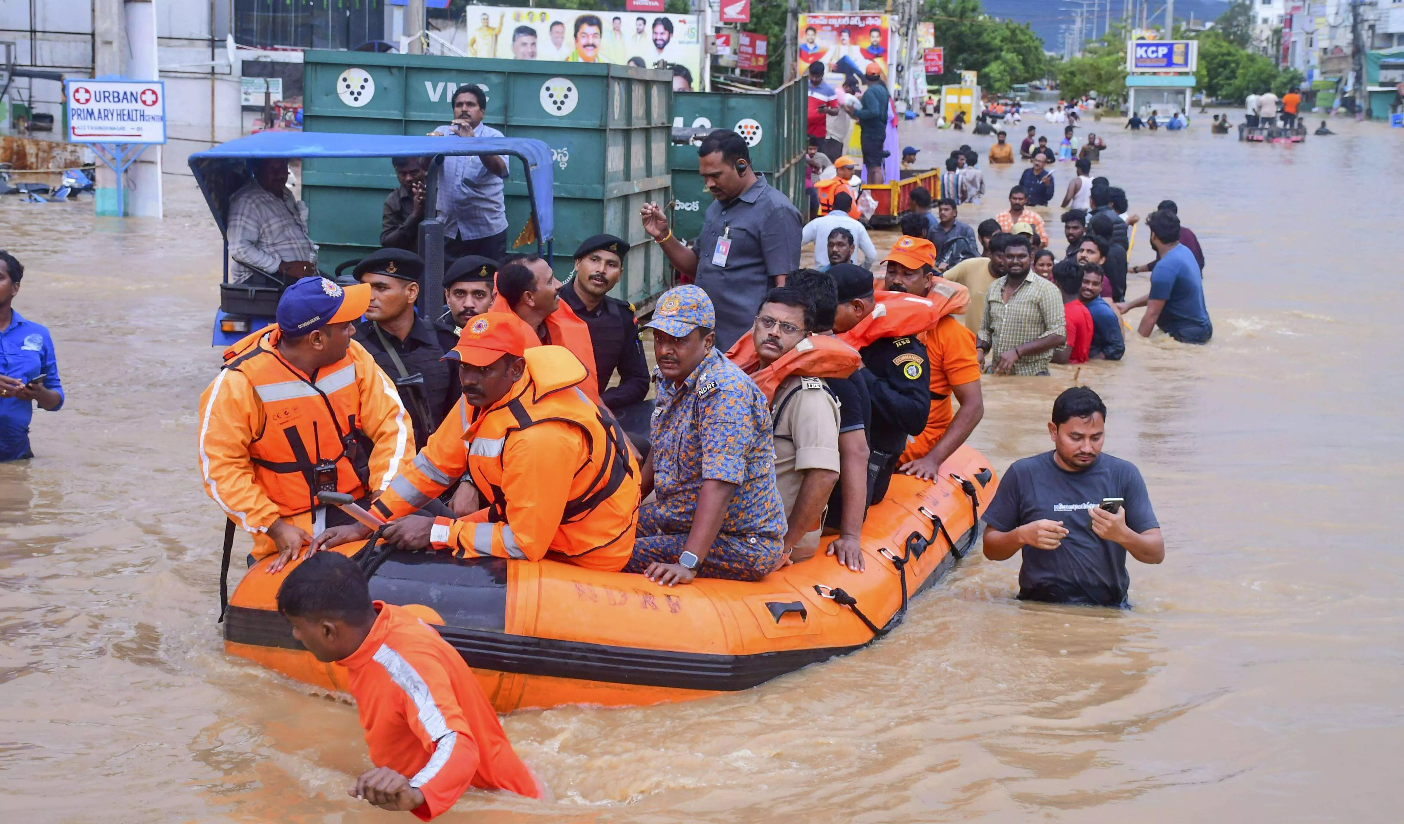 Rains throw life out of gear in Vijayawada with power cuts, traffic disruption
