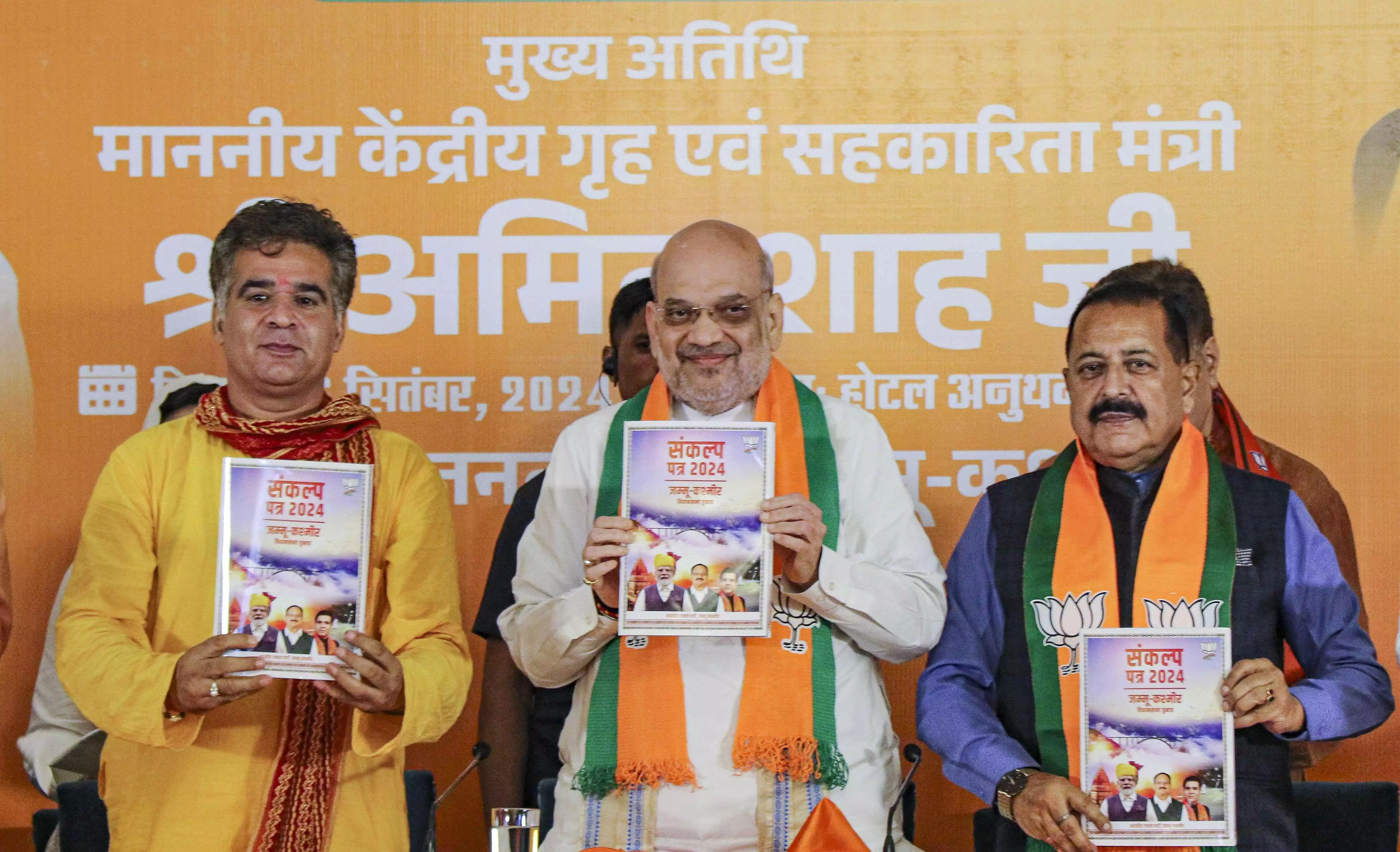 Article 370 now history, will never come back: Amit Shah at BJP manifesto launch for J&K polls Article 370 now history, will never come back: Amit Shah at BJP manifesto launch for J&K polls
