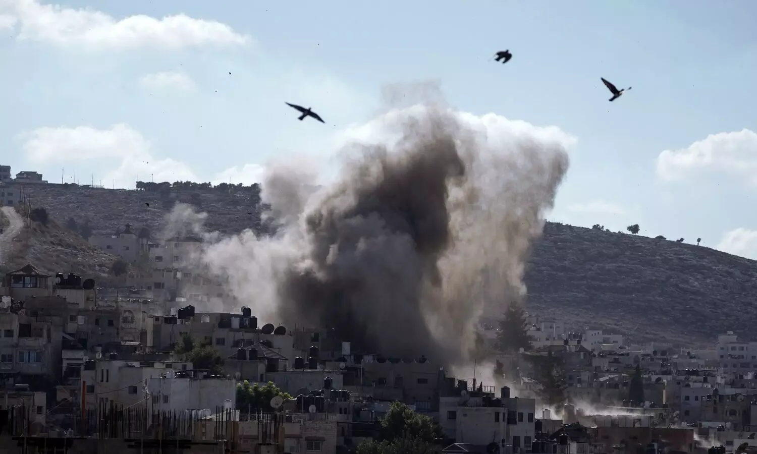 Israeli strikes in Gaza kill more than a dozen as health workers press on with polio vaccines