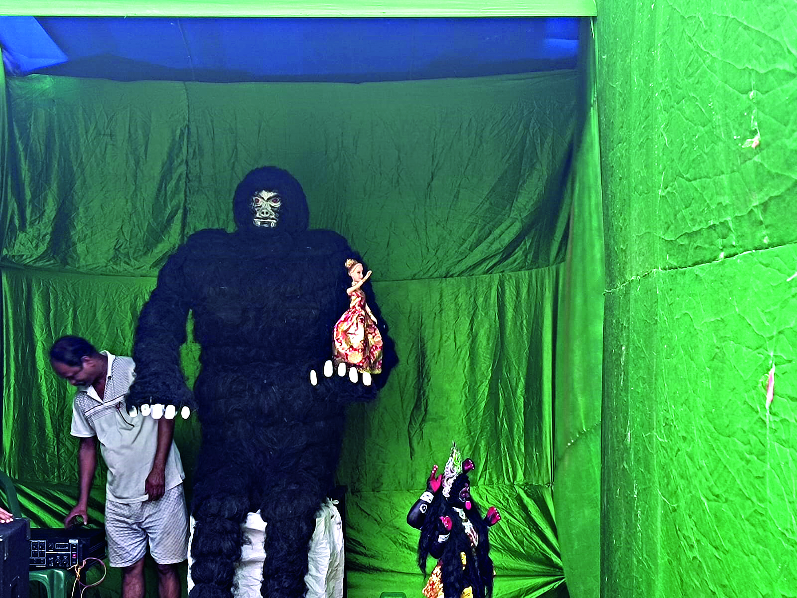 NBSTC employees in Raiganj prepare models with scrap parts of buses for Biswakarma Puja