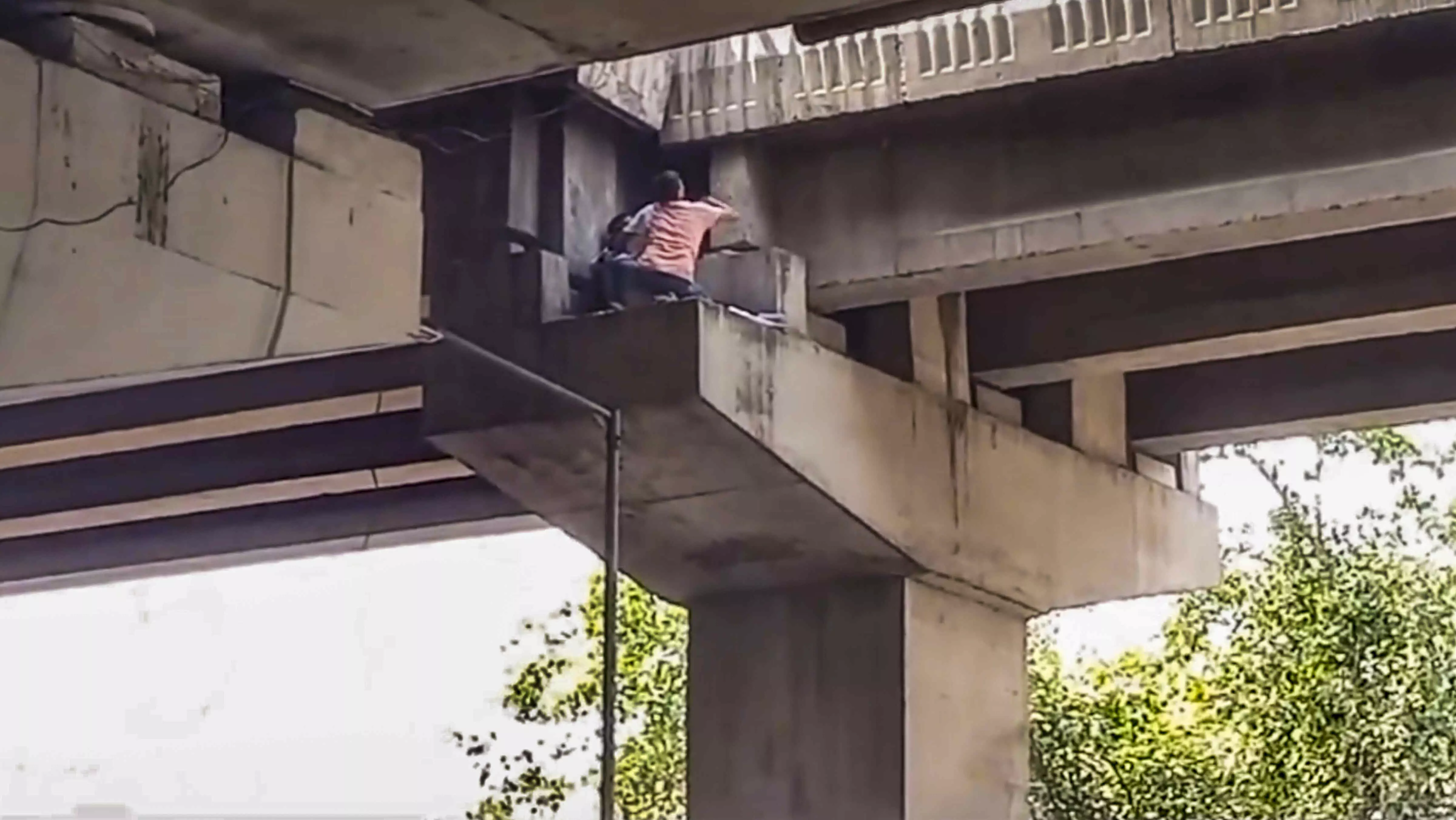Woman gets stuck in flyover pillar in Noida, rescued Woman gets stuck in flyover pillar in Noida, rescued