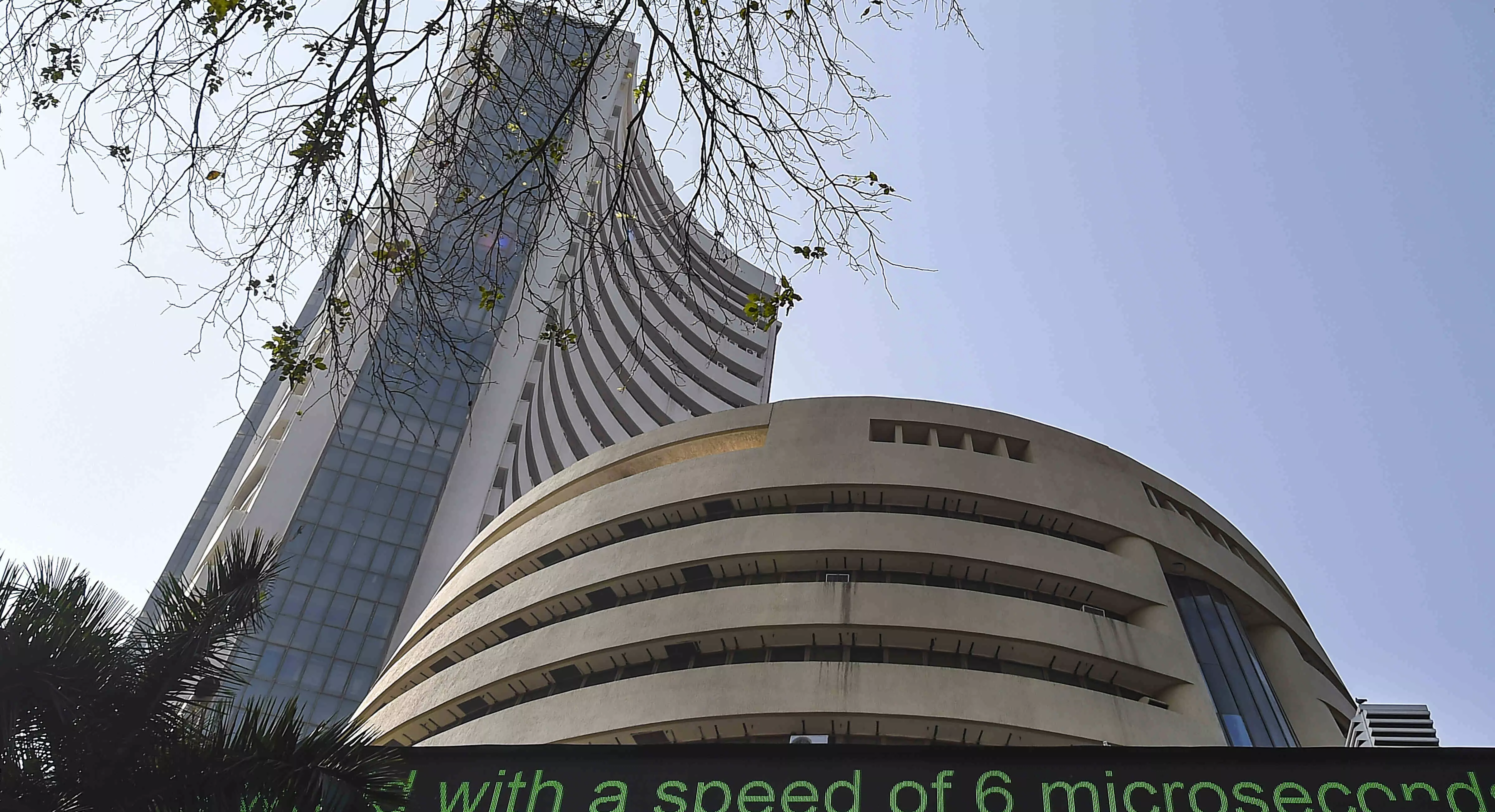 Sensex hits 85,000 level for 1st time before closing flat; FMCG, banking shares drag