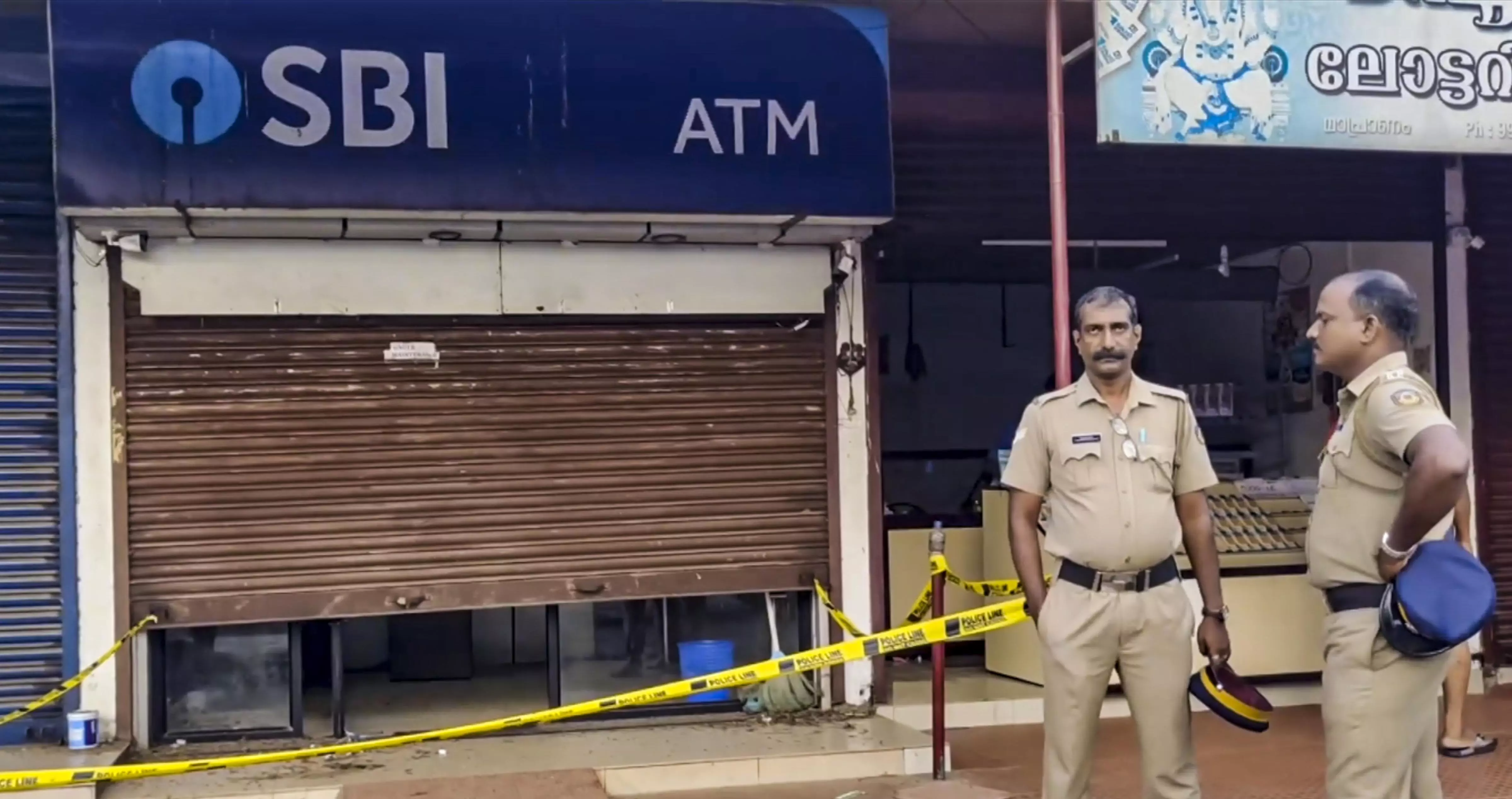 Unidentified gang loots Rs 70 lakh from three ATMs in Keralas Thrissur Unidentified gang loots Rs 70 lakh from three ATMs in Keralas Thrissur