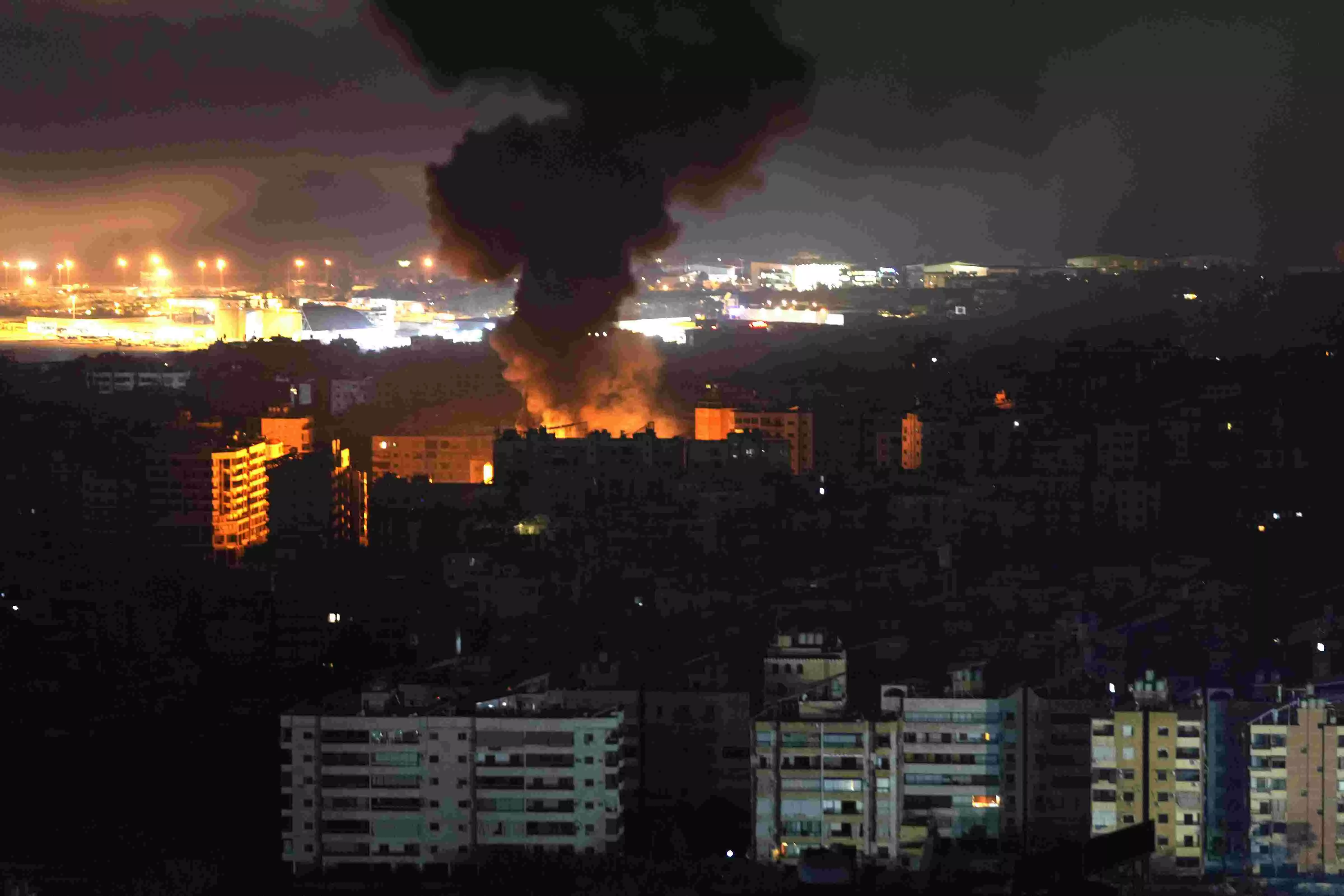 Hezbollah steps up rocket fire as Israel sends more troops into Lebanon