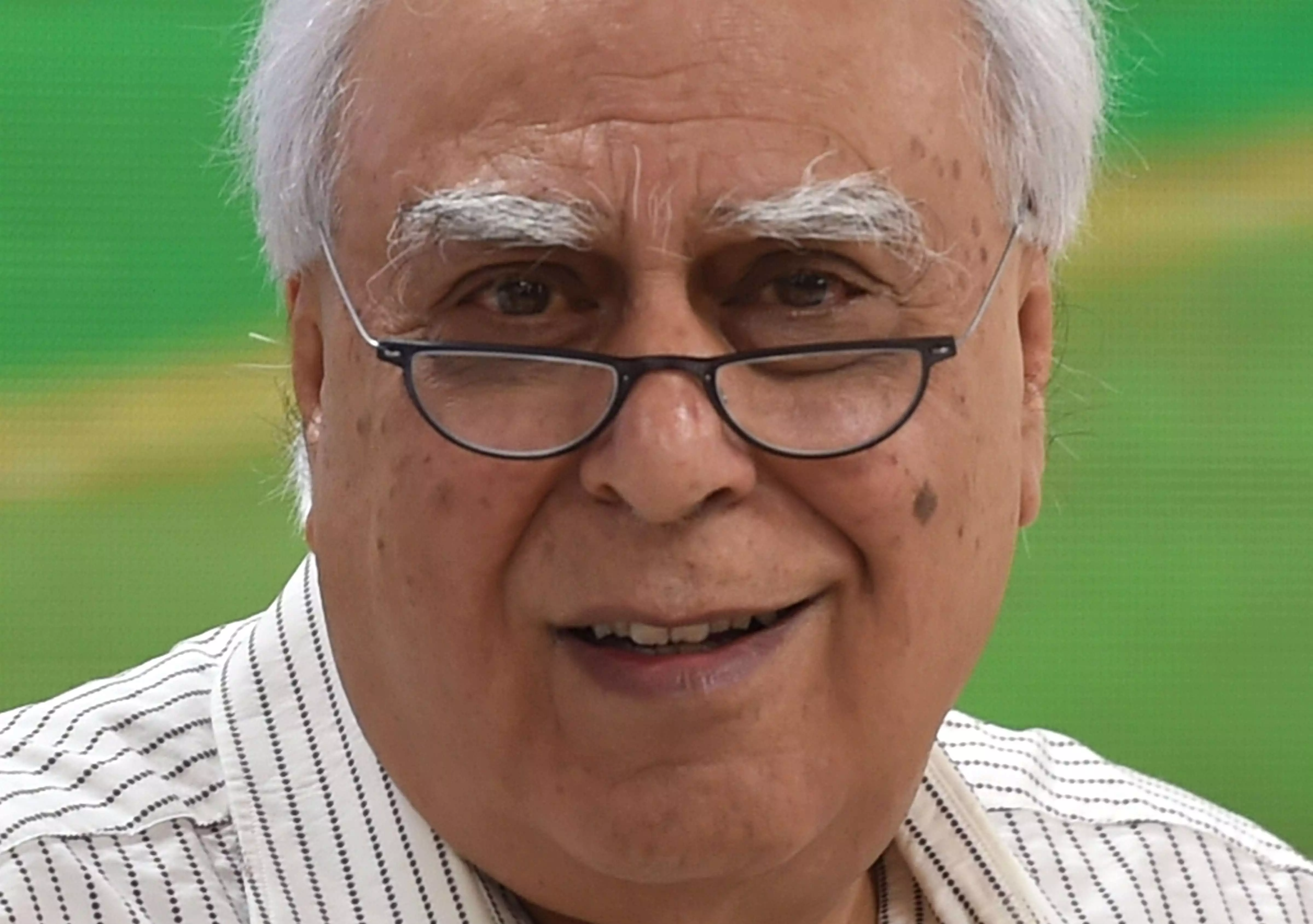 Complete disconnect between Bhagwats remarks and what govt does: Sibal