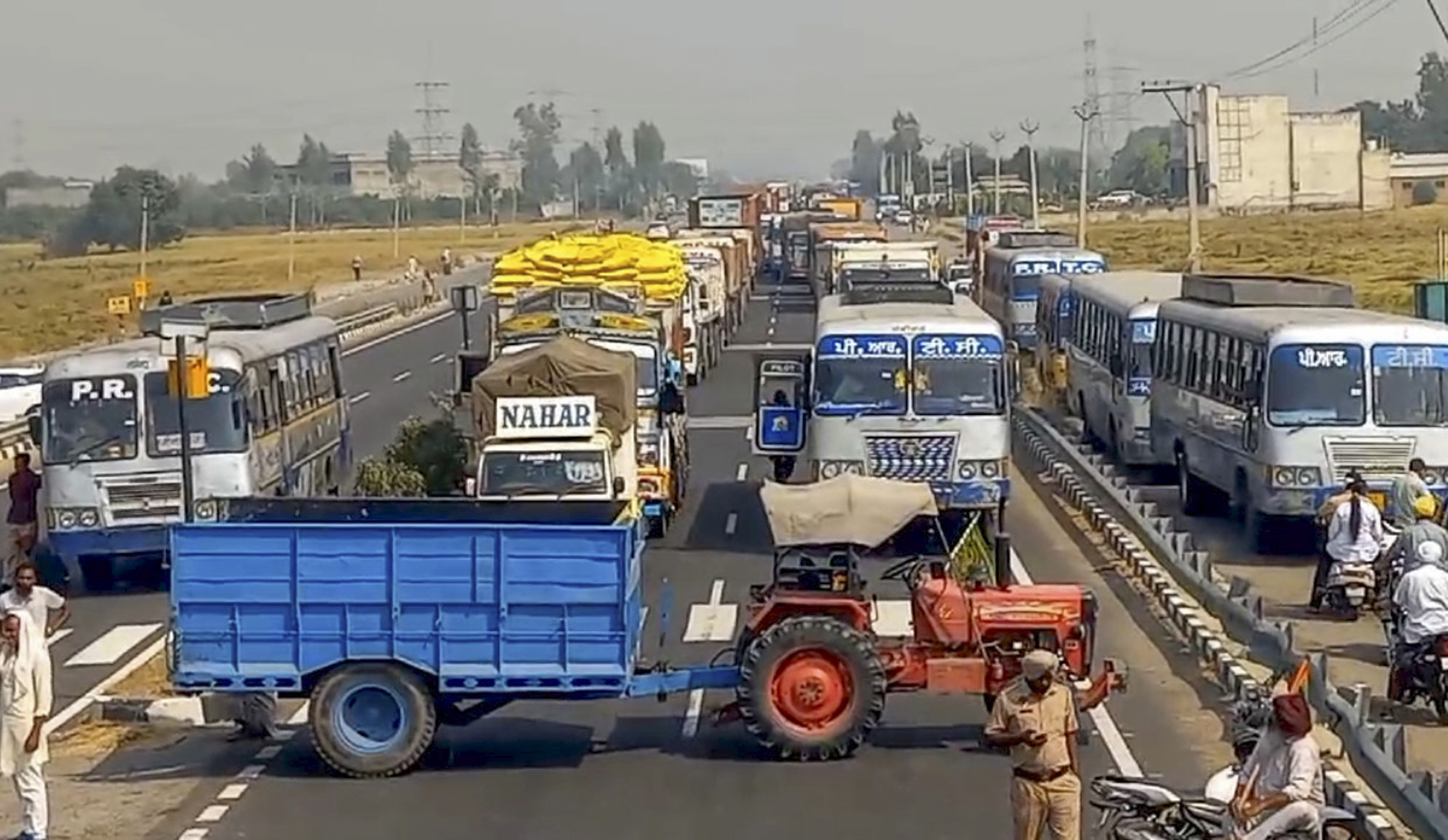 Farmers block highway in Phagwara to protest tardy paddy procurement Farmers block highway in Phagwara to protest tardy paddy procurement