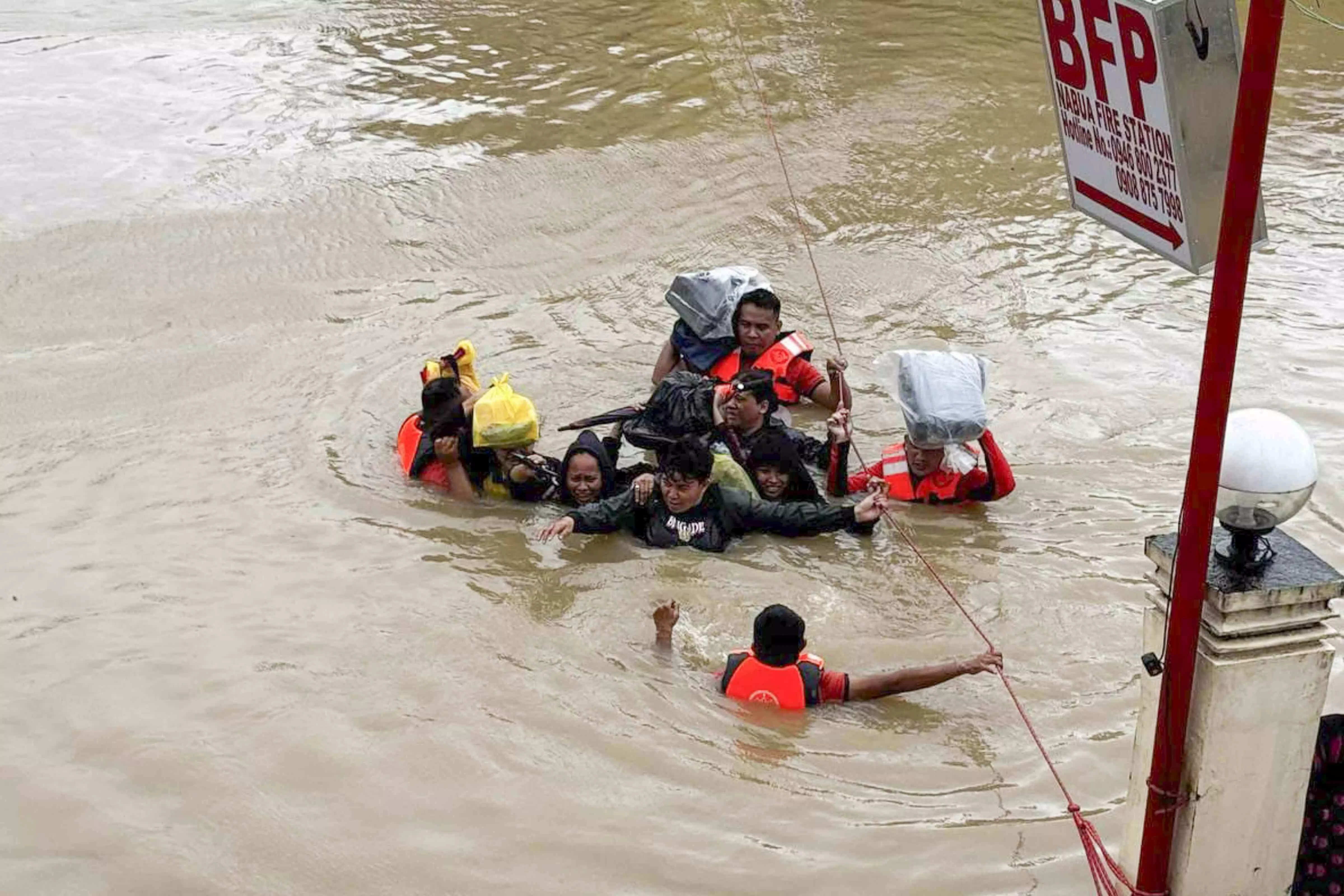 Tropical storm battering Philippines leaves at least 23 people dead in flooding and landslides Tropical storm battering Philippines leaves at least 23 people dead in flooding and landslides