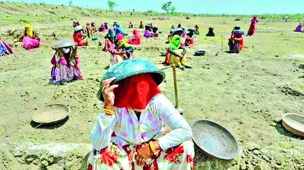 Govt, under fire over MGNREGS enrolment drop, says no fixed targets for demand-driven scheme Govt, under fire over MGNREGS enrolment drop, says no fixed targets for demand-driven scheme