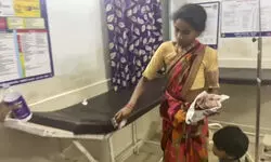 MP: Pregnant tribal woman made to wash blood stains off hospital bed as injured husband dies MP: Pregnant tribal woman made to wash blood stains off hospital bed as injured husband dies