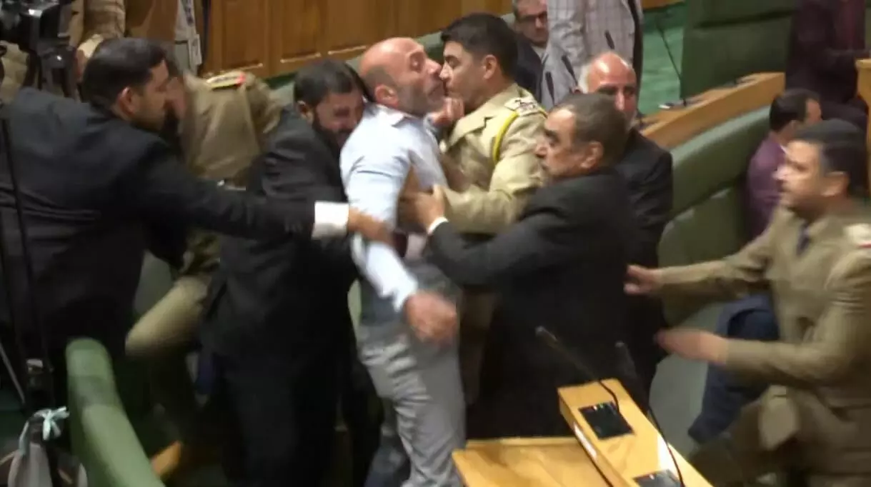 Uproar in J-K Assembly as BJP members protest over special status resolution Uproar in J-K Assembly as BJP members protest over special status resolution