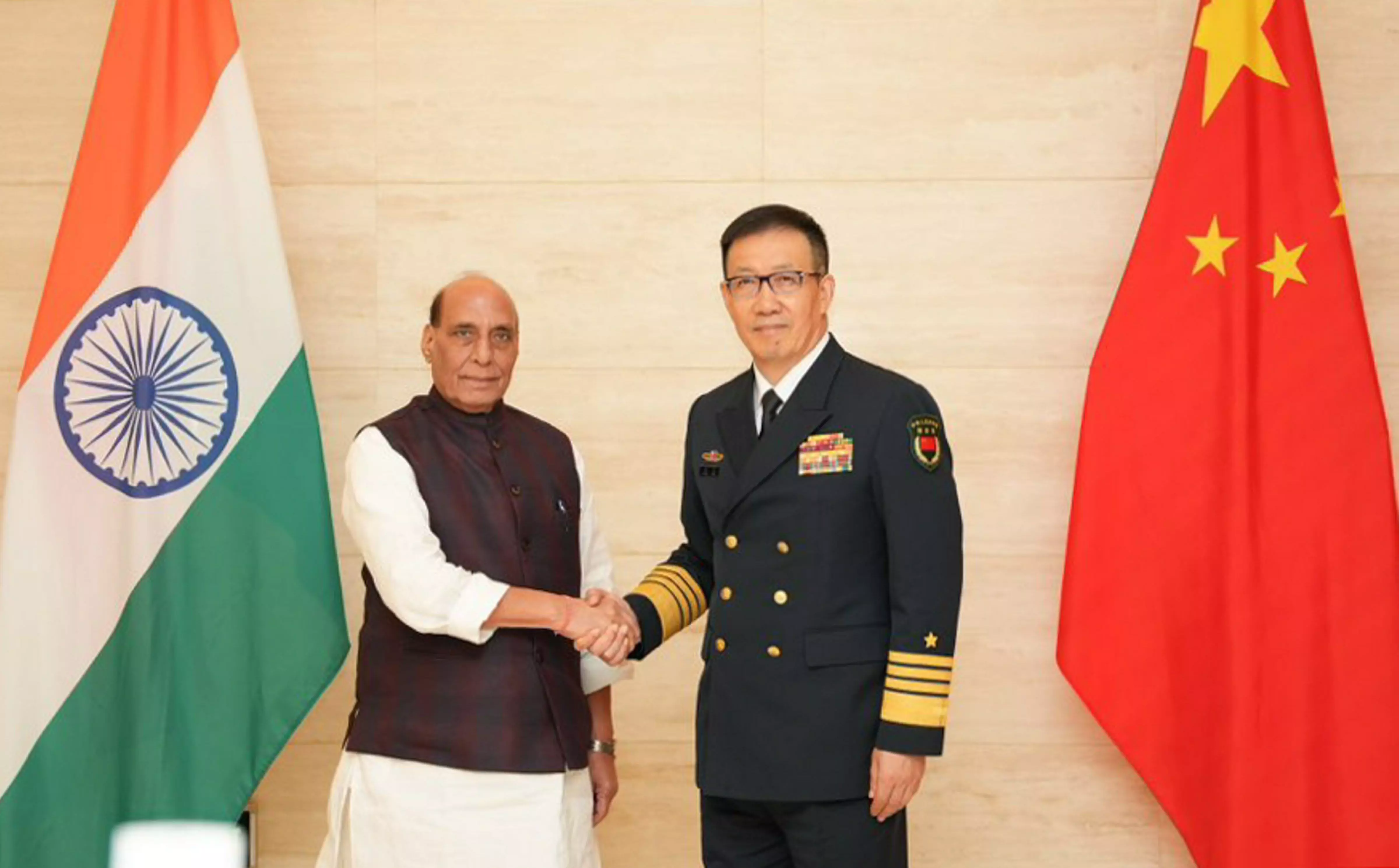 India, China defence ministers meet in Laos; agree to work towards rebuild mutual trust India, China defence ministers meet in Laos; agree to work towards rebuild mutual trust